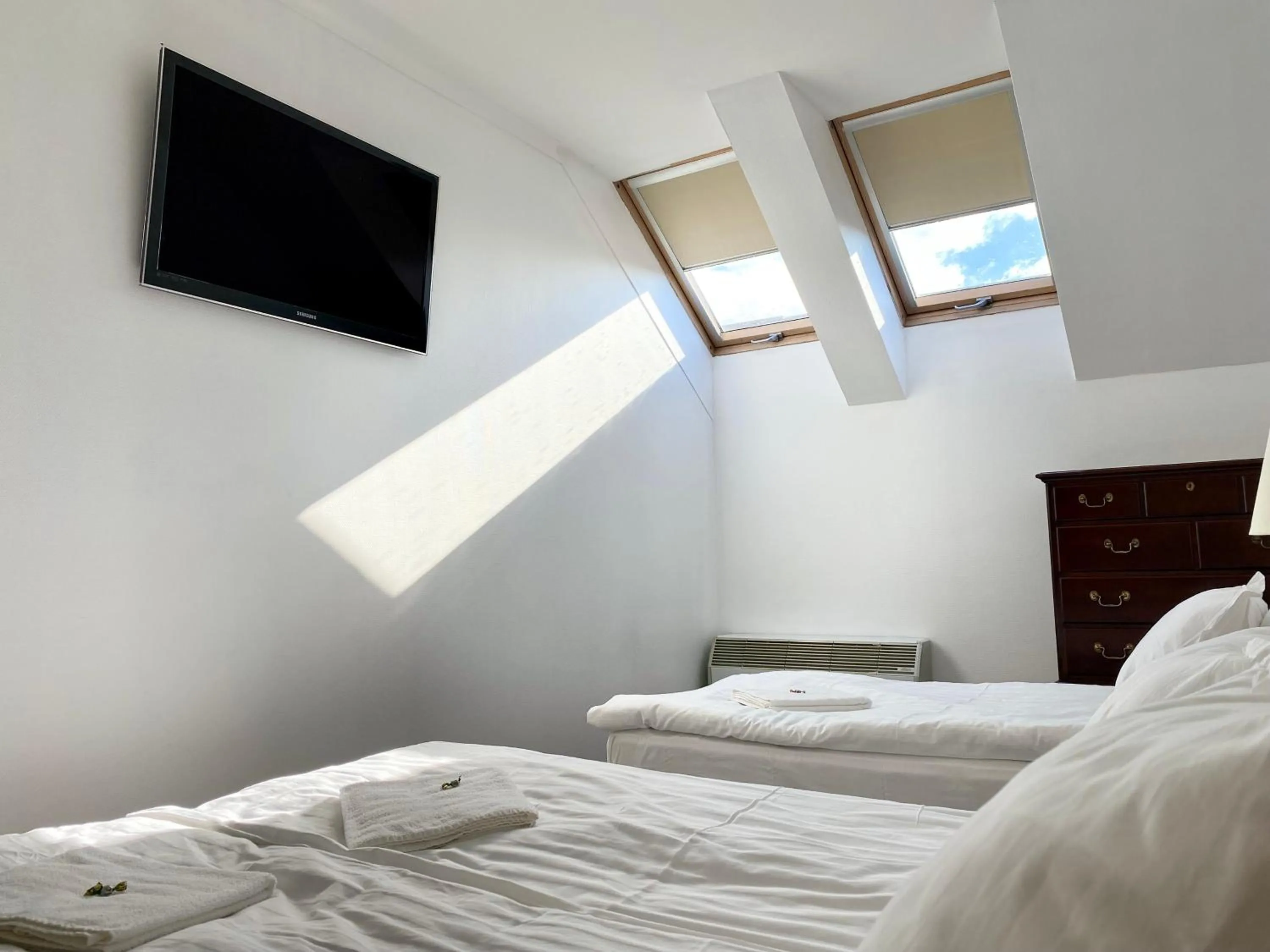 Bed in OPERA16 Guestrooms