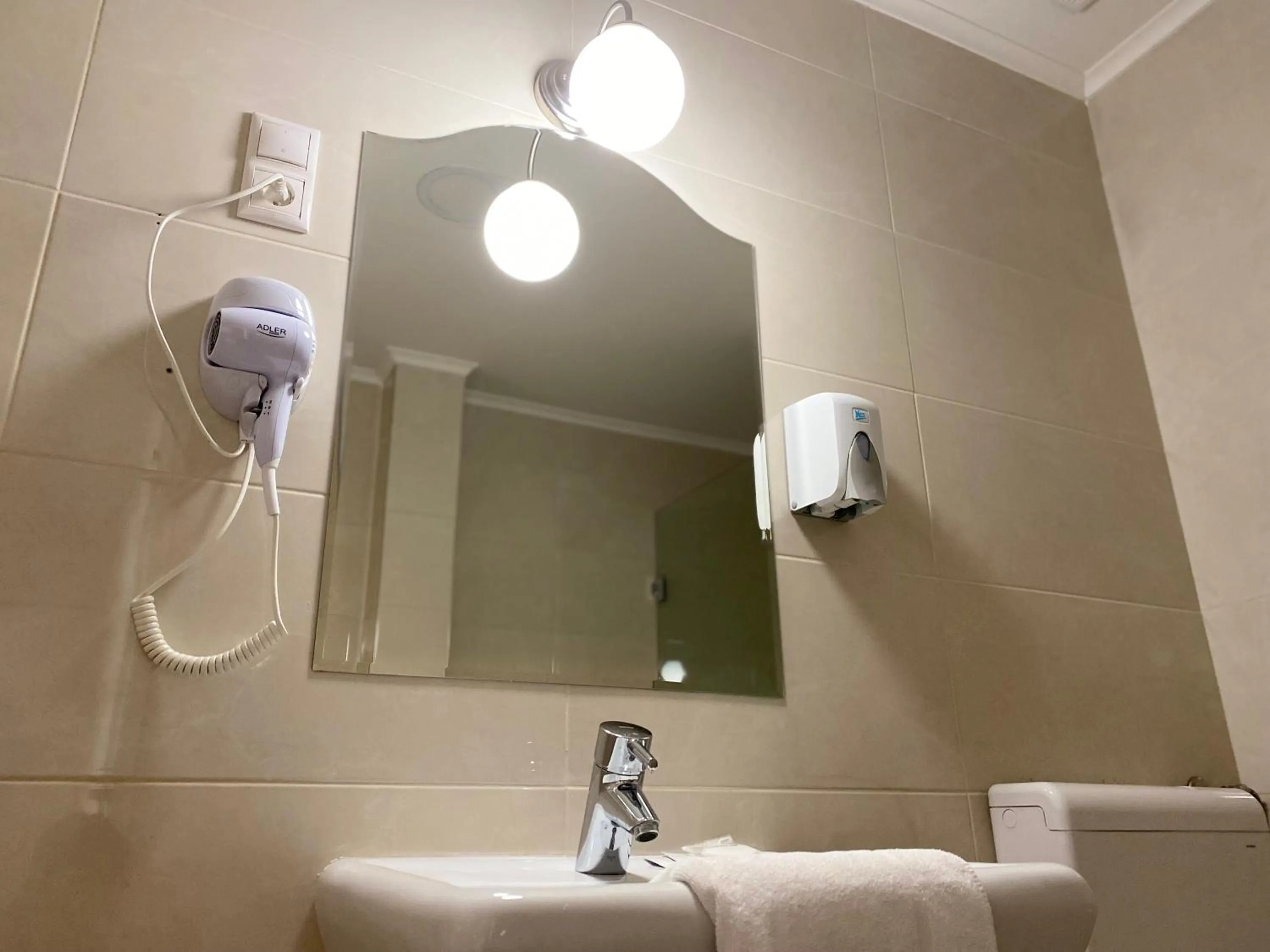 Bathroom in OPERA16 Guestrooms