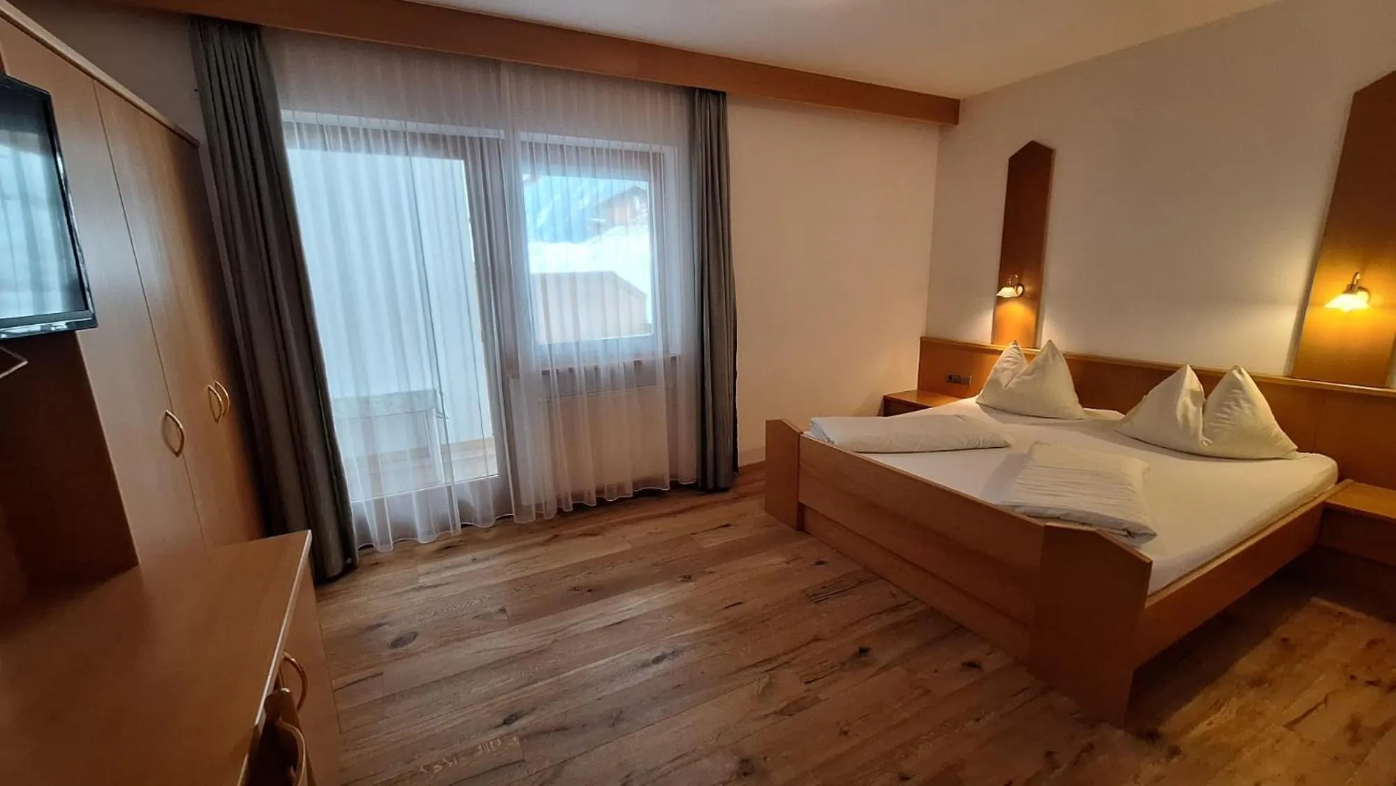Bed in Alpenspitz Appartements - Garni - B&B
