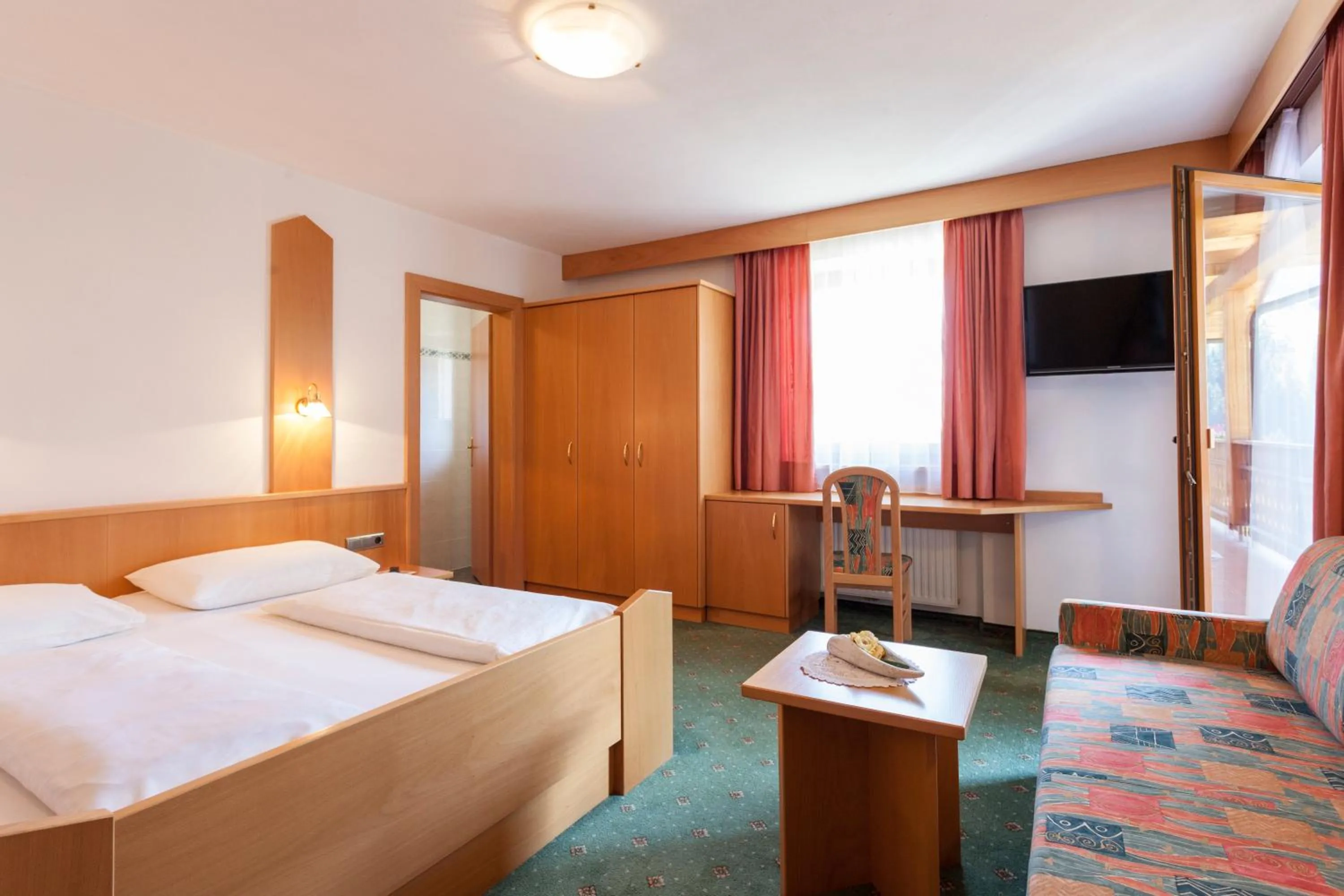 Bed in Alpenspitz Appartements - Garni - B&B