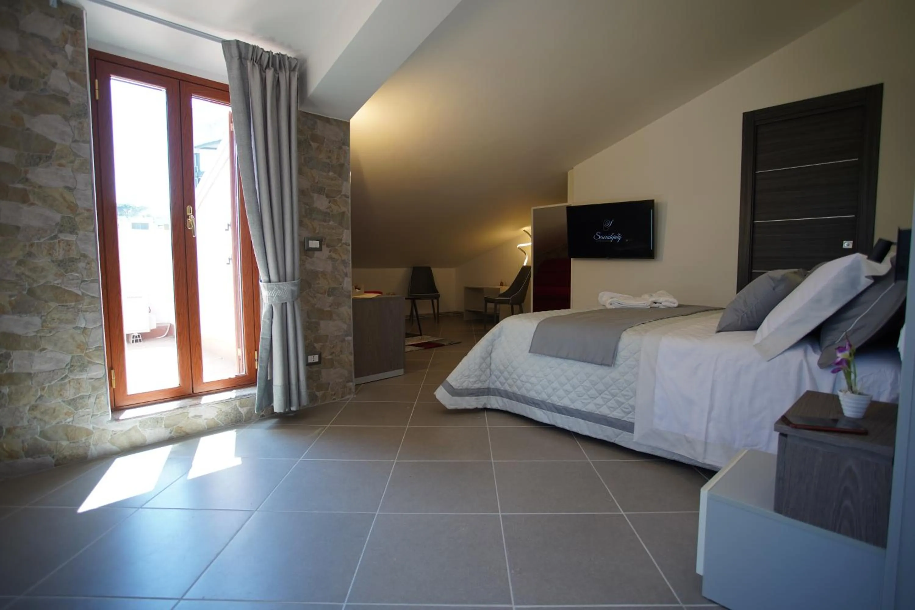 Bed in Serendipity B&B