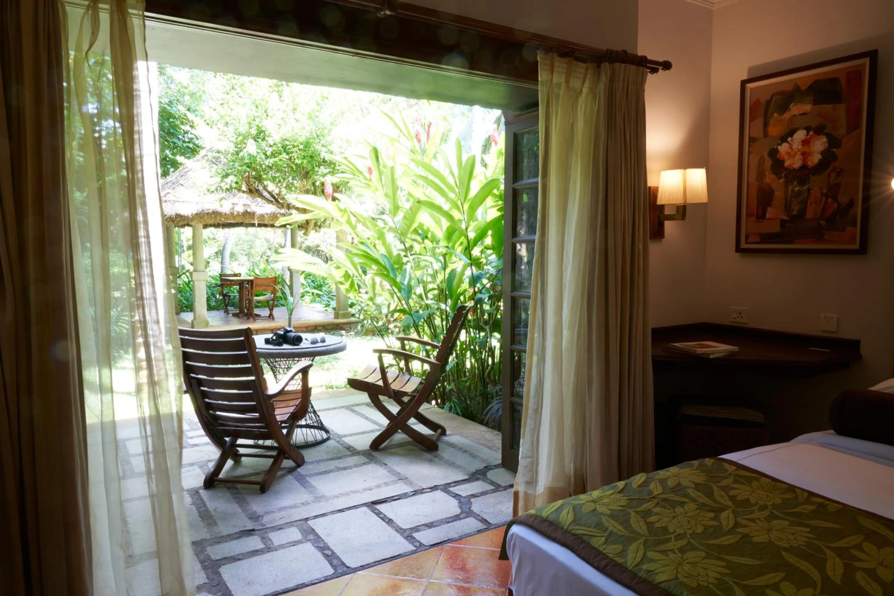 Bed in Taj Green Cove Resort and Spa Kovalam