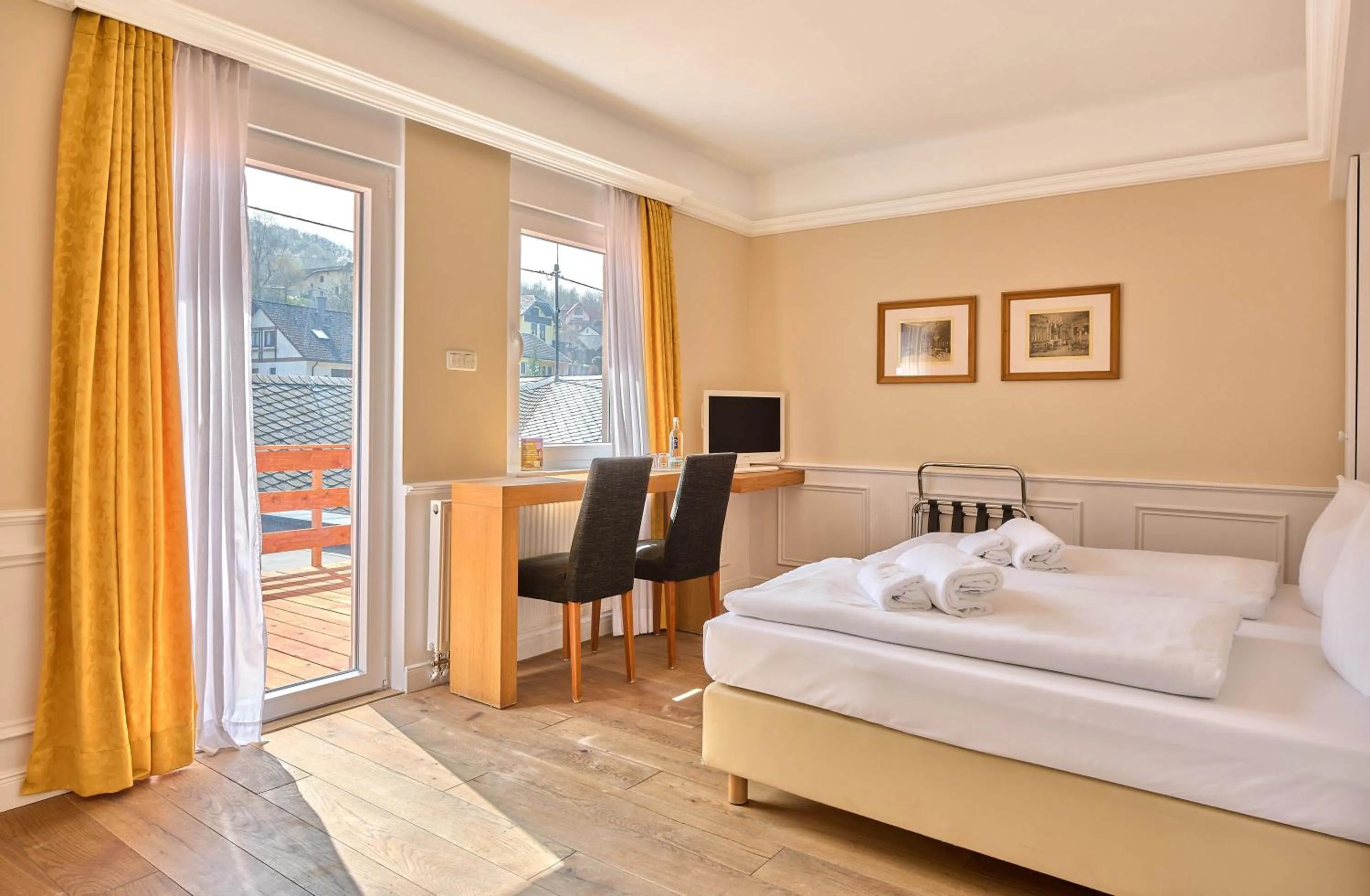 Bed in Hotel Weinberg-Schlößchen