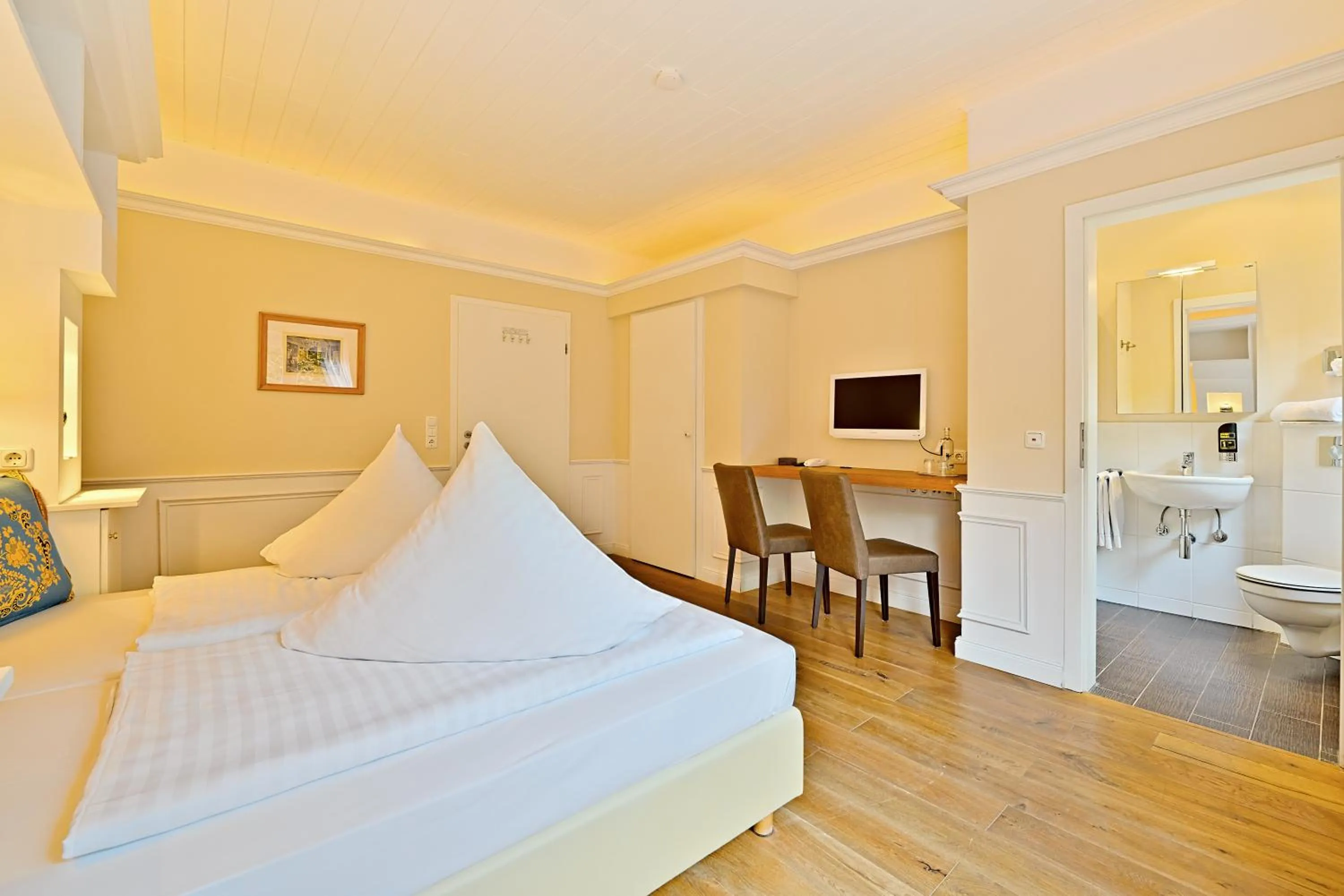 Bed in Hotel Weinberg-Schlößchen