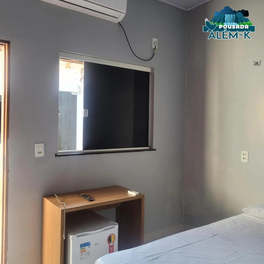 Bed in POUSADA ALÉM-K