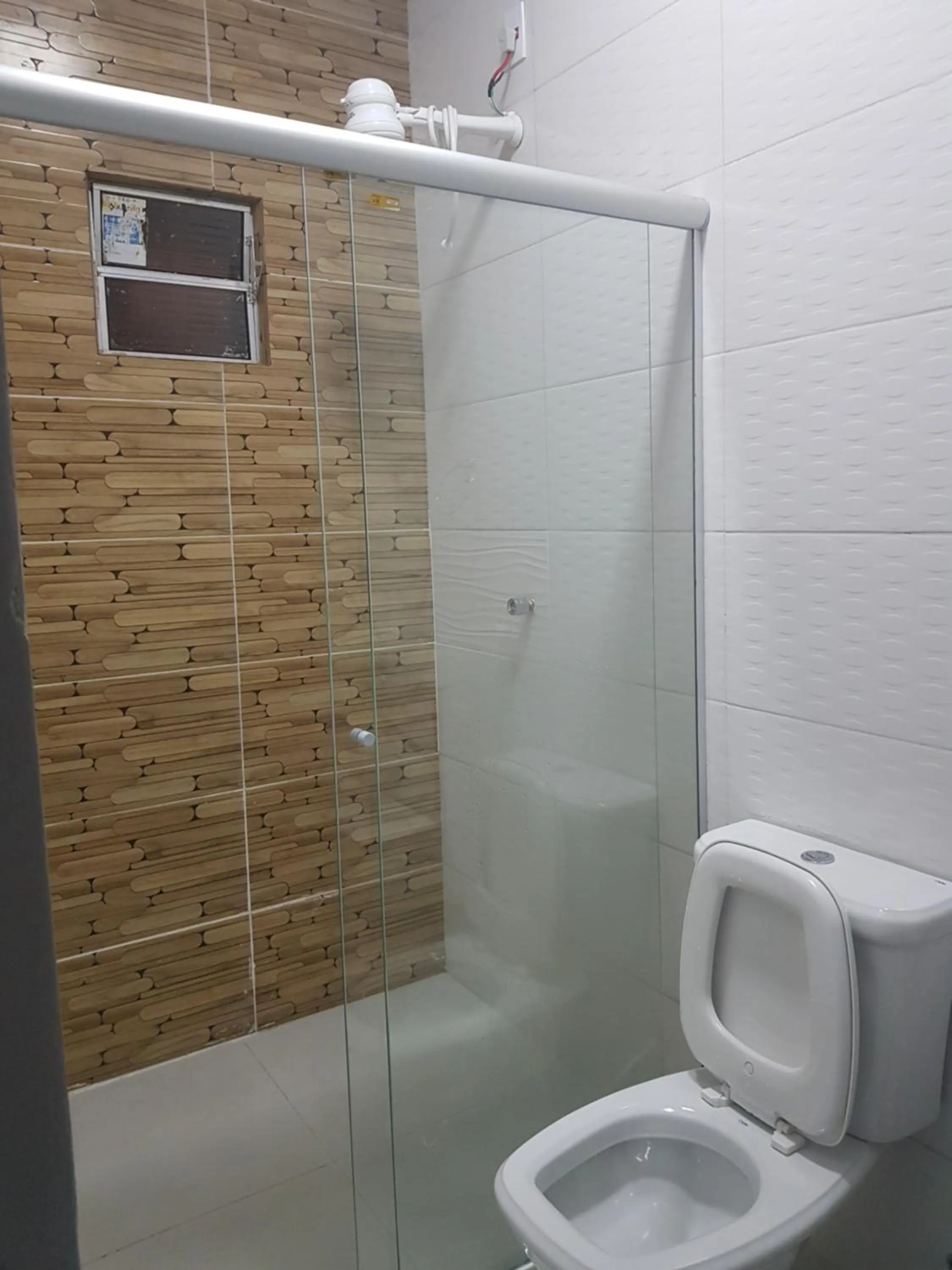 Bathroom in POUSADA ALÉM-K