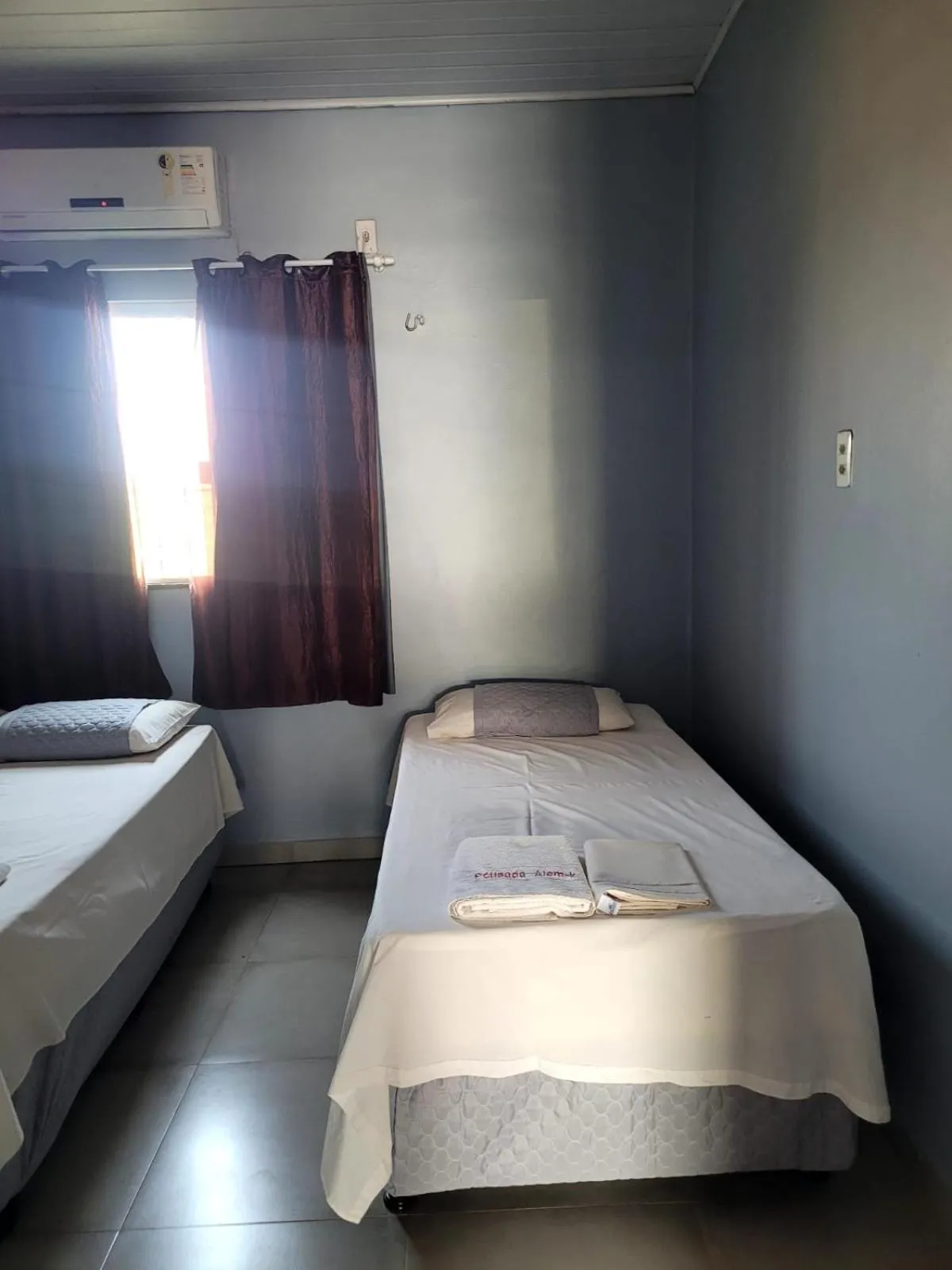 Bed in POUSADA ALÉM-K