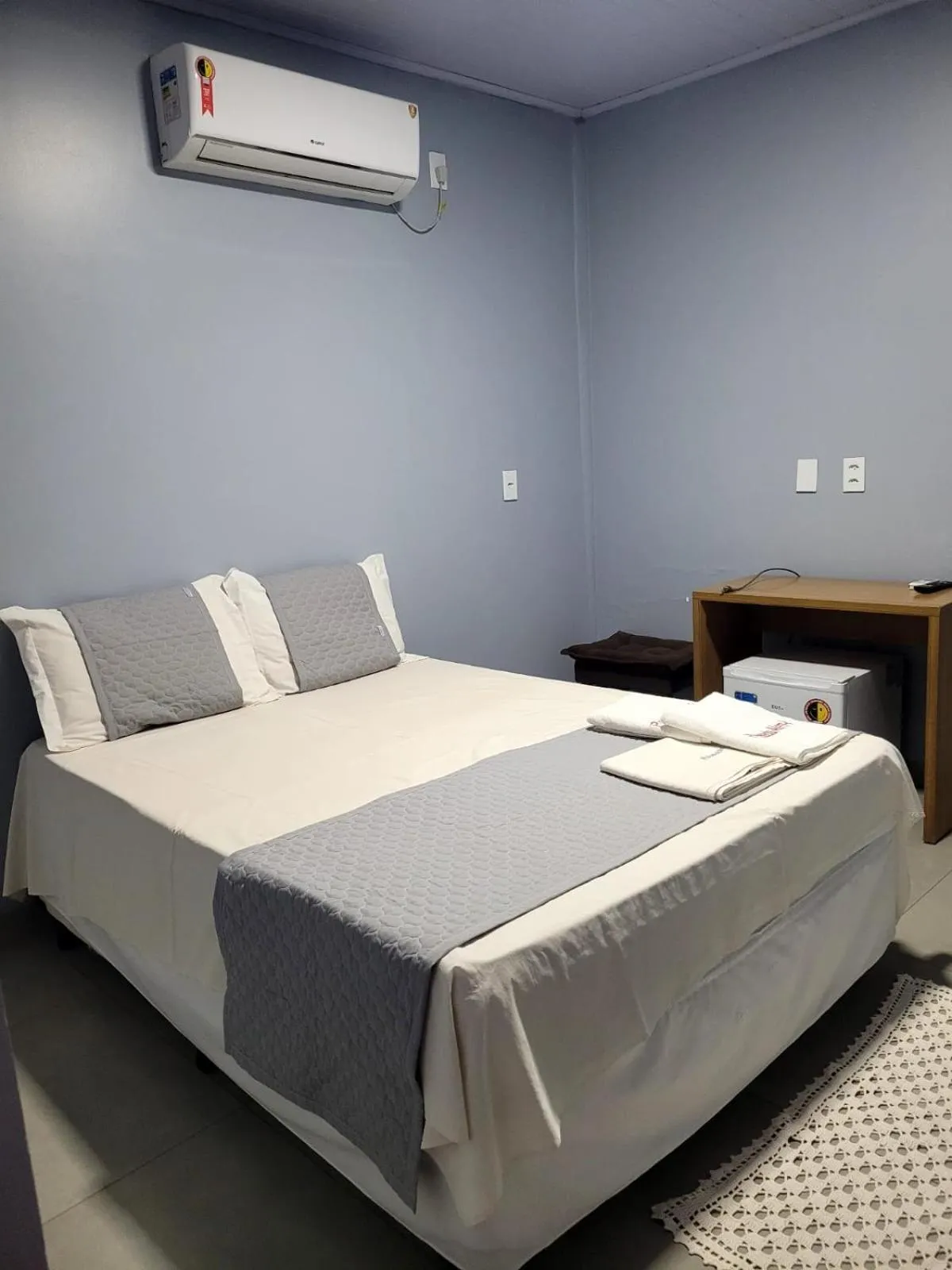 Bed in POUSADA ALÉM-K