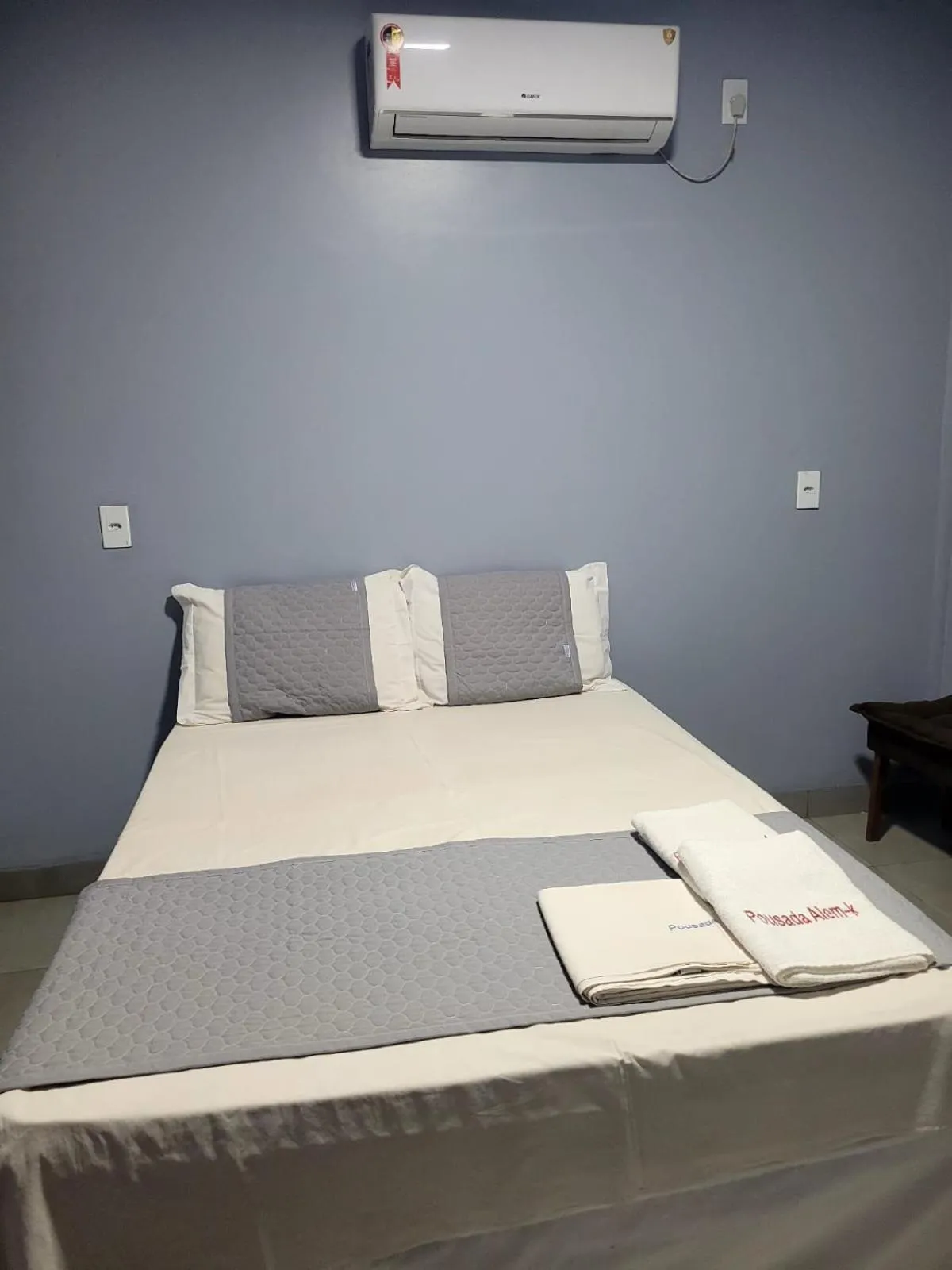 Bed in POUSADA ALÉM-K