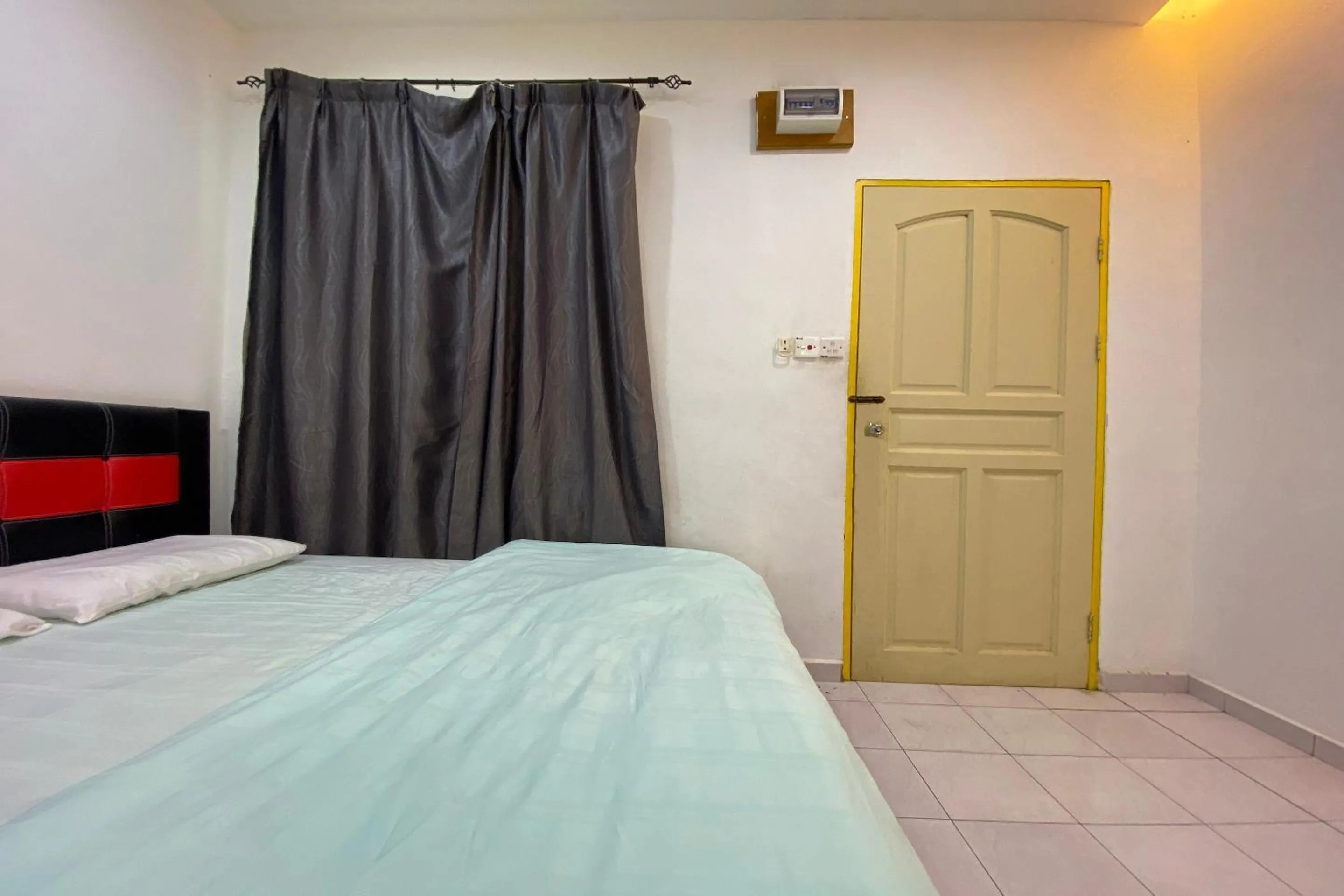 Bedroom, Bed in Hotel O Taman Kota Homestay