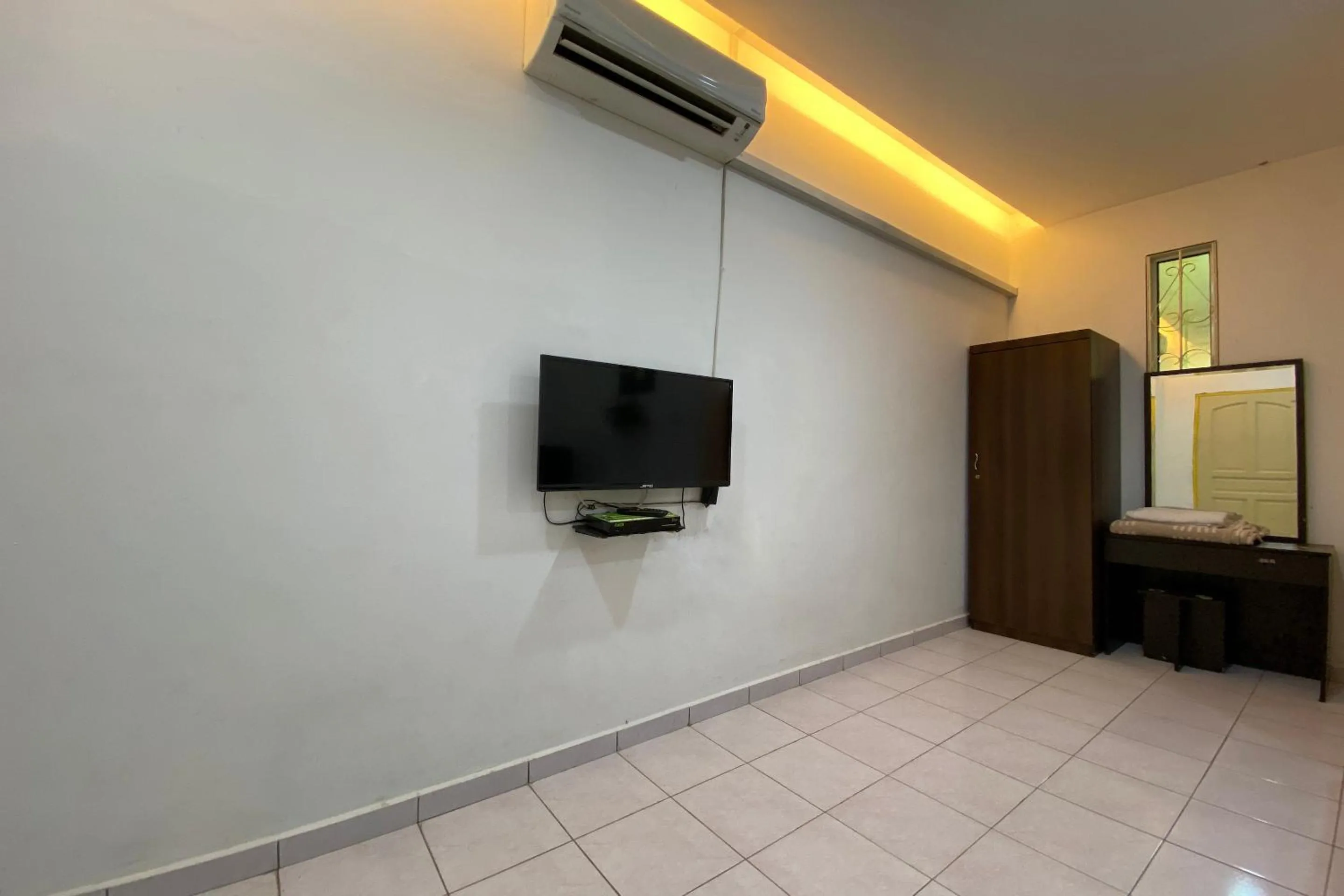 Bedroom in Hotel O Taman Kota Homestay