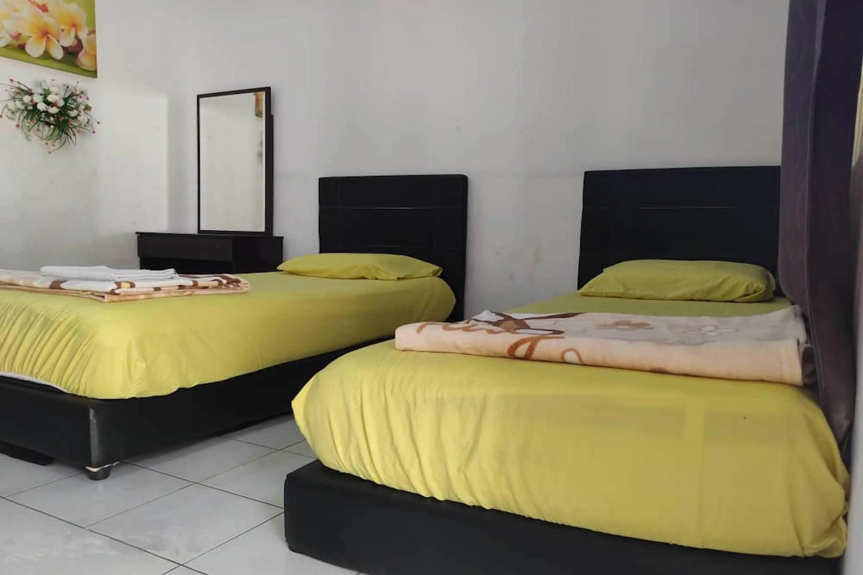 Bedroom, Bed in Hotel O Taman Kota Homestay