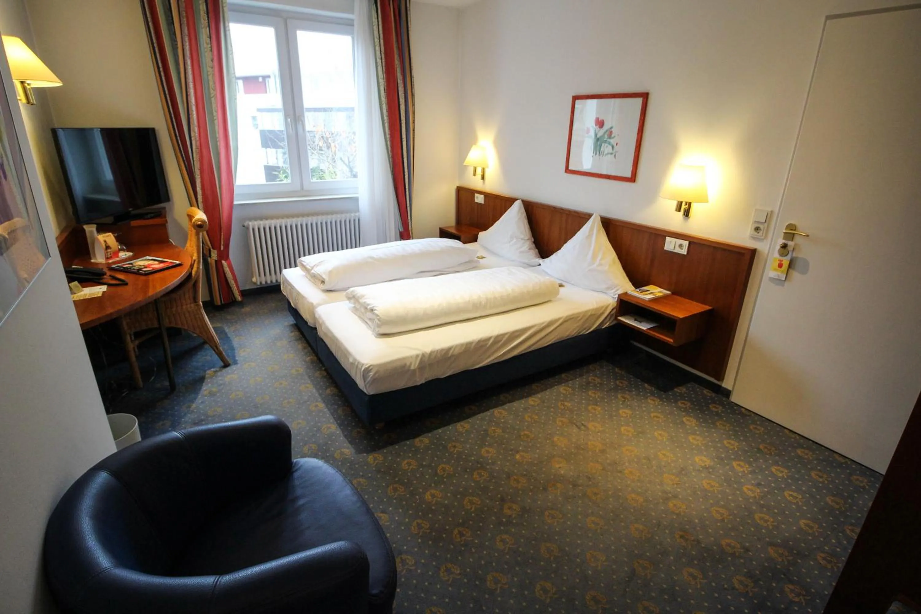 Bed in Ringhotel Zum Goldenen Ochsen