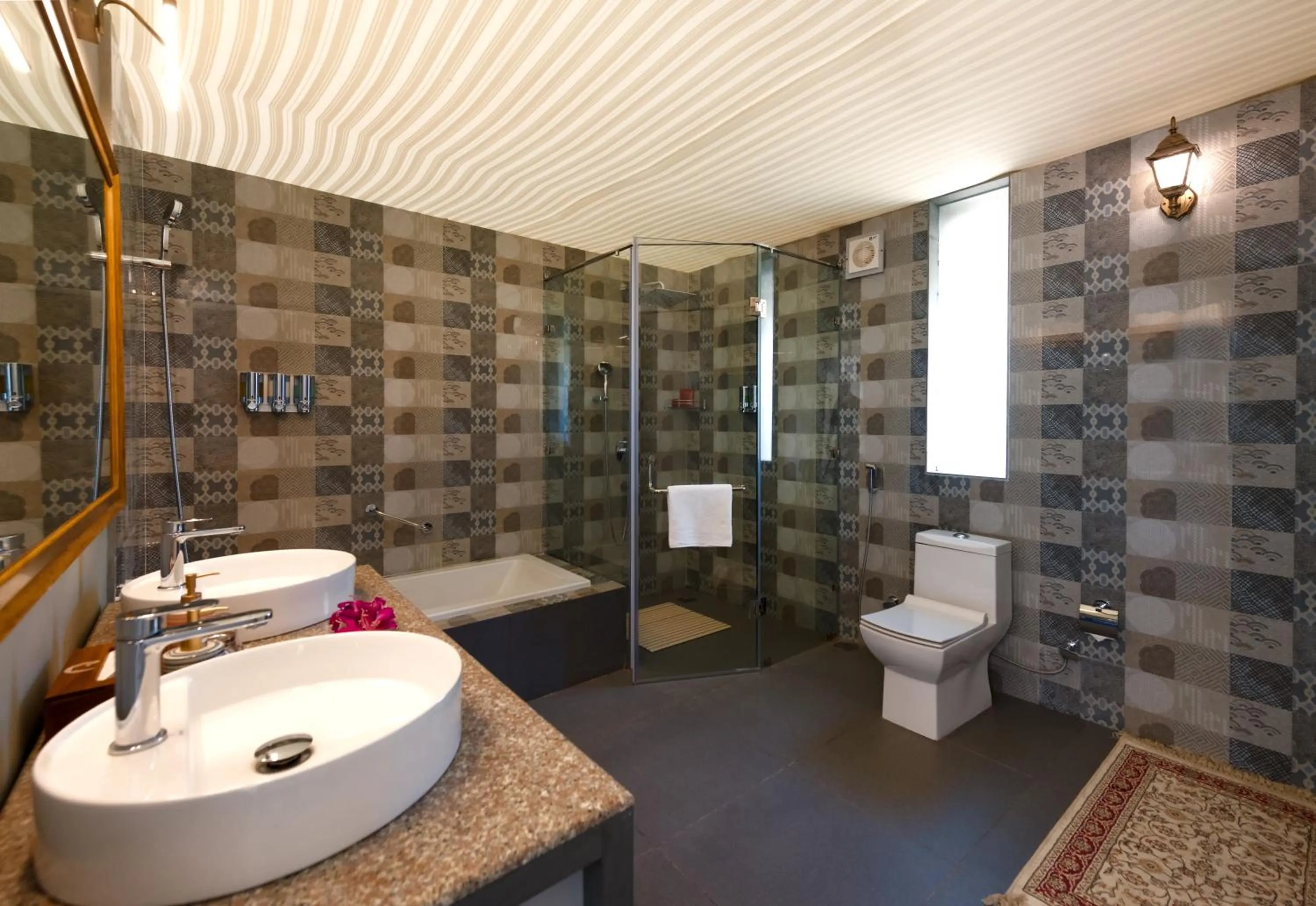 Shower in WelcomHeritage Cheetahgarh Resort & Spa