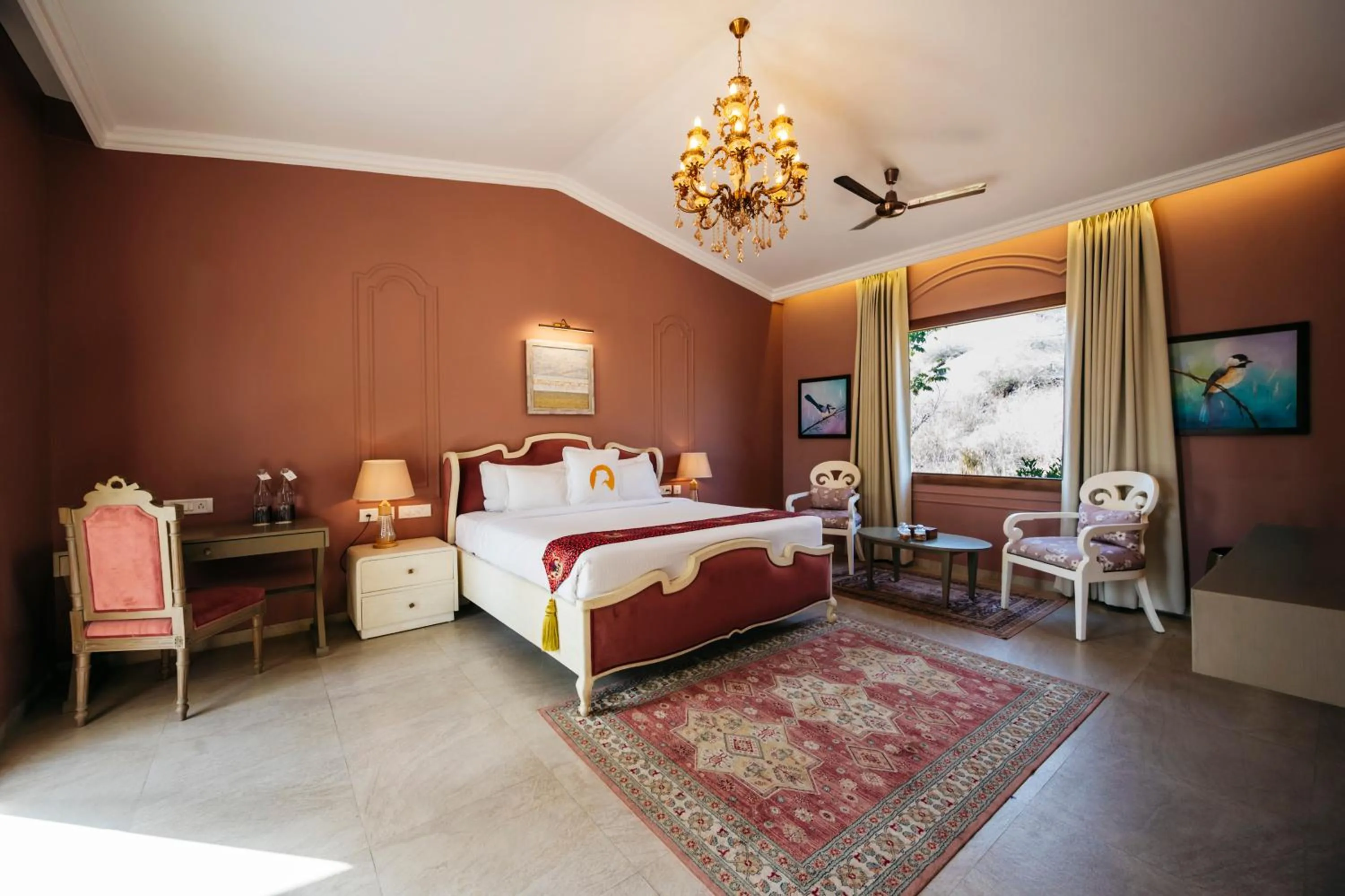 Bed in WelcomHeritage Cheetahgarh Resort & Spa
