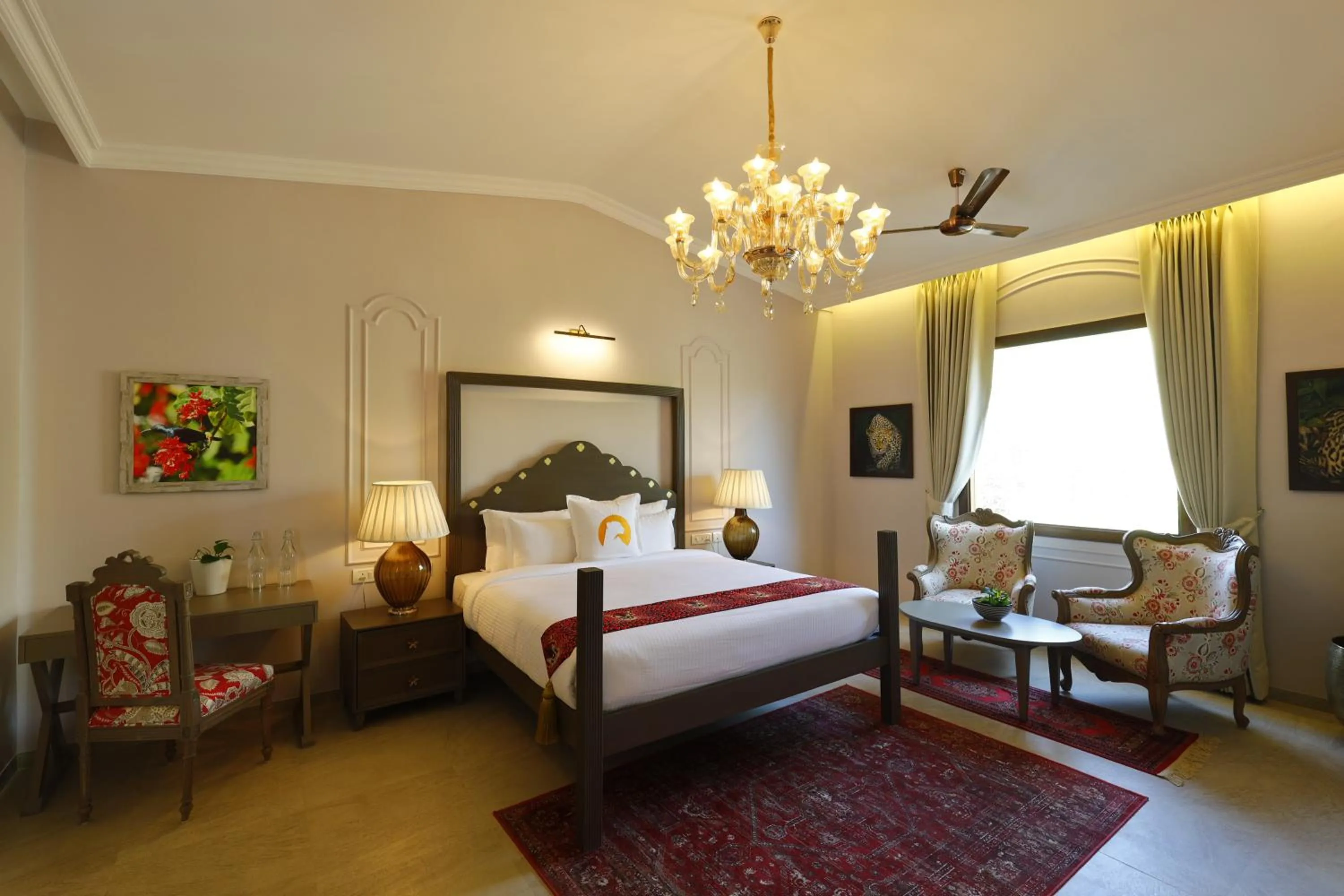 Bed in WelcomHeritage Cheetahgarh Resort & Spa