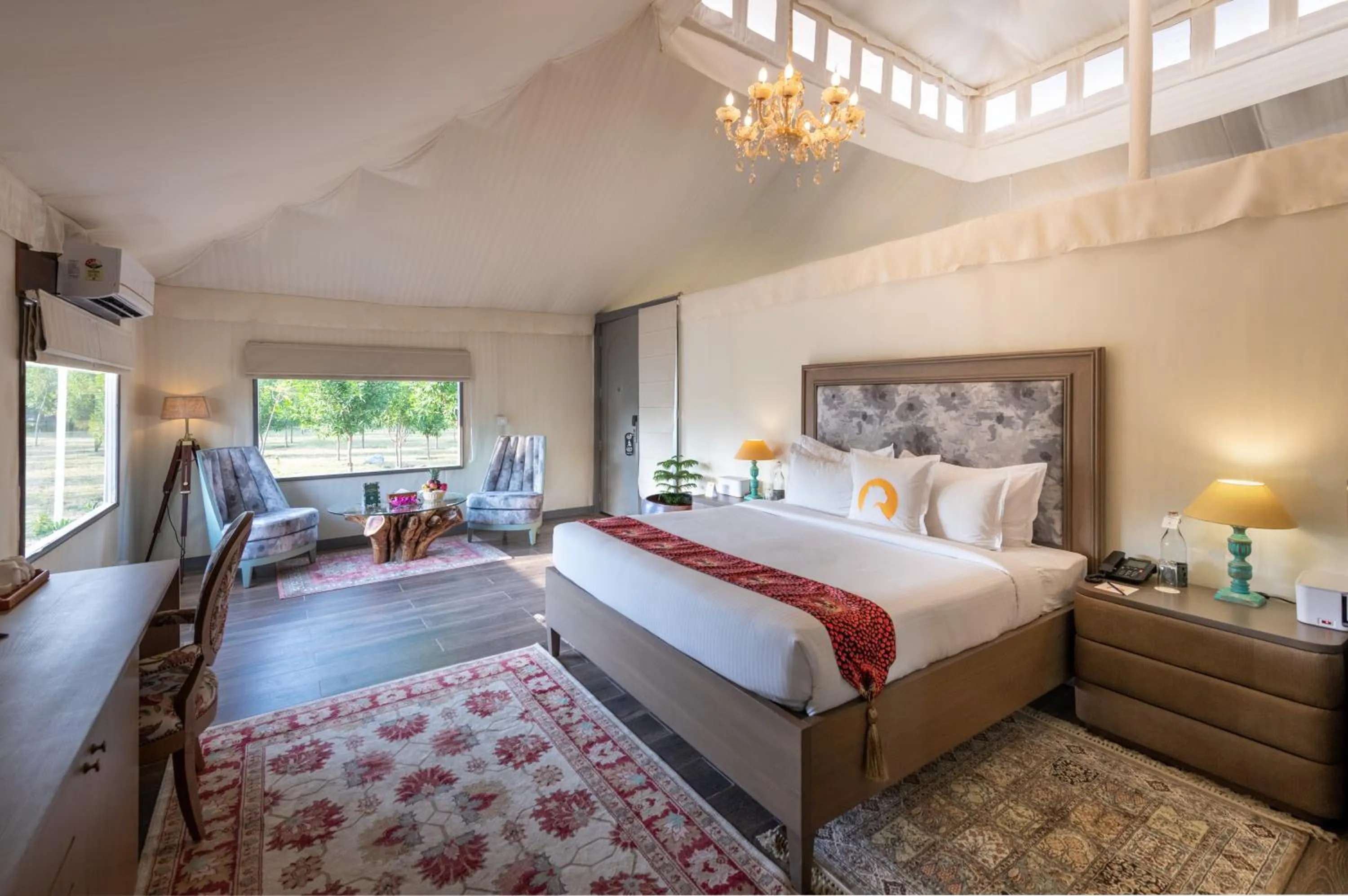 Bed in WelcomHeritage Cheetahgarh Resort & Spa