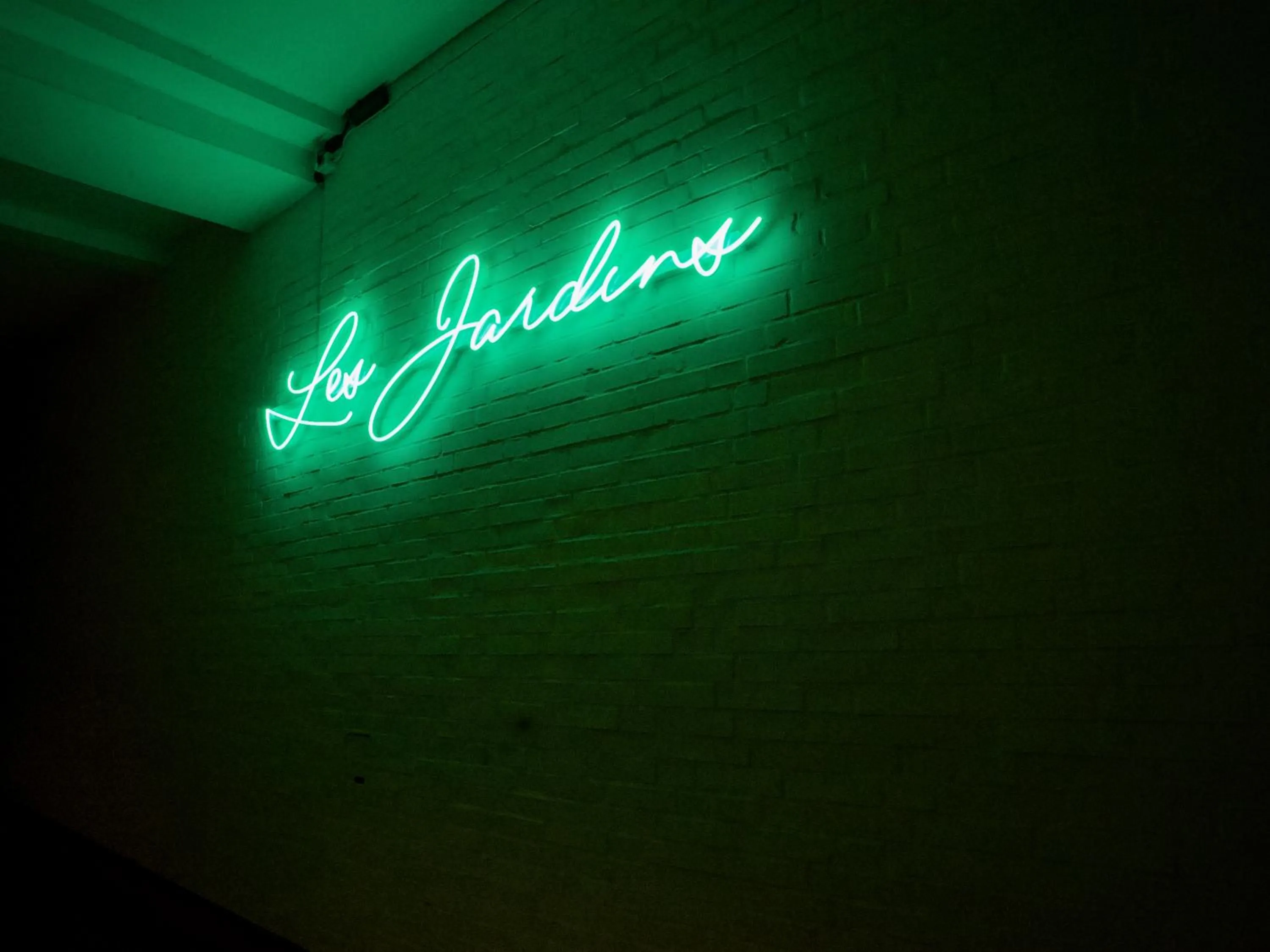 Property logo or sign in Apartments Les Jardins