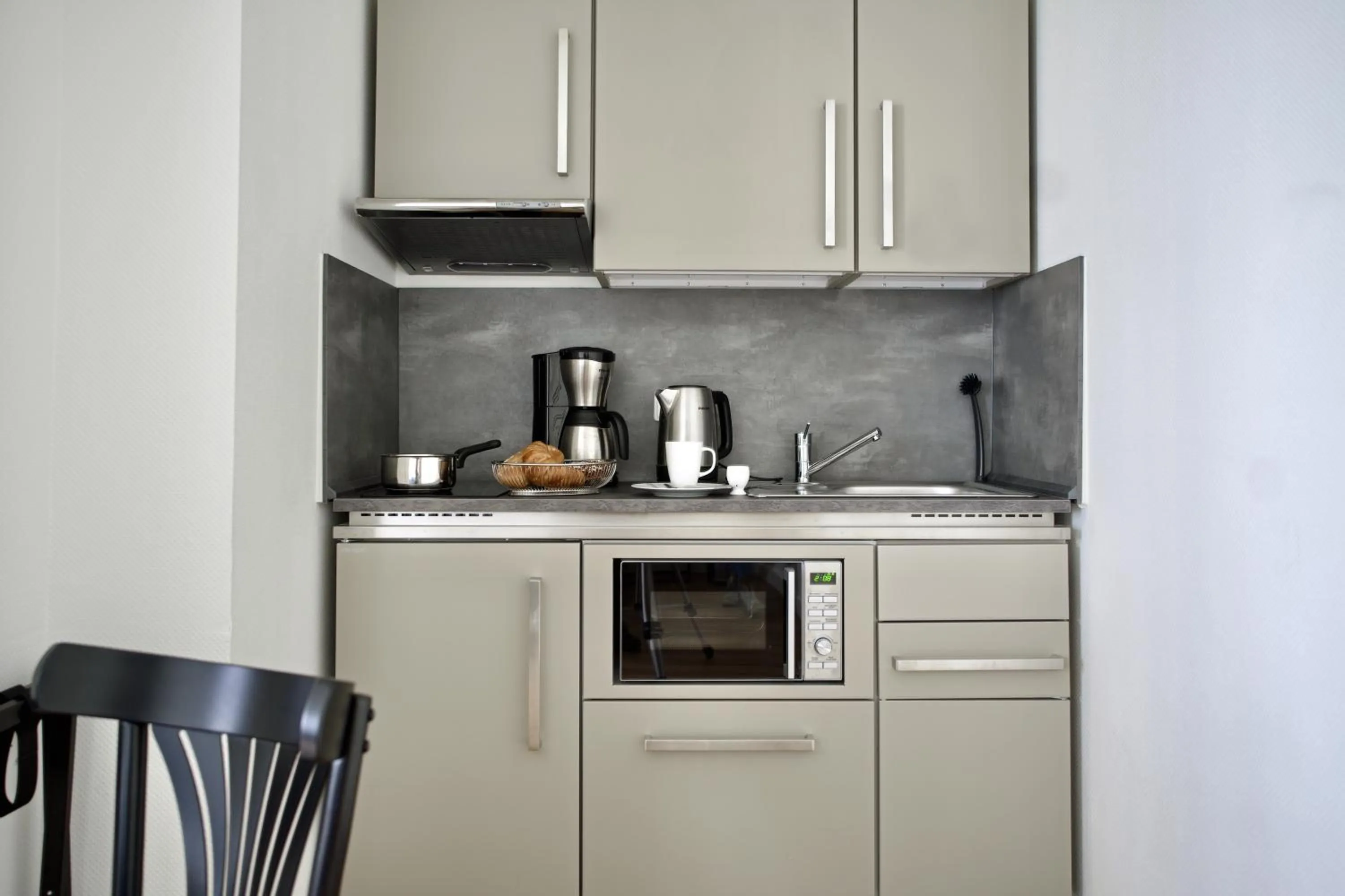Kitchen or kitchenette in Apartments Les Jardins