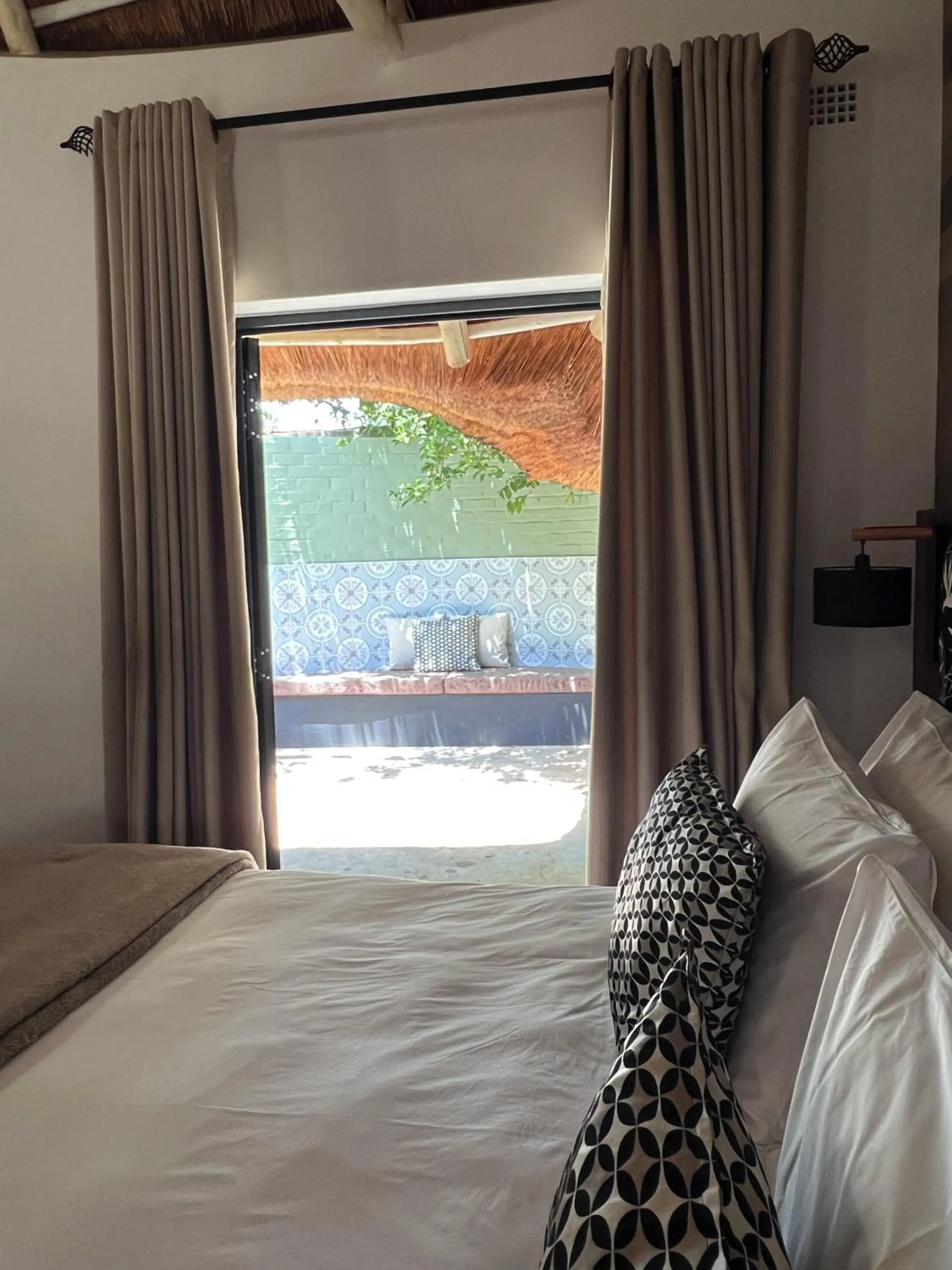 Patio, Bed in Pamarah Lodge