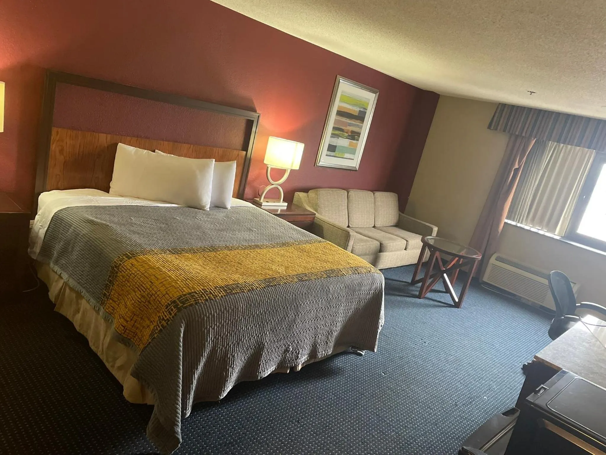 Bed in Apm Inn & Suites