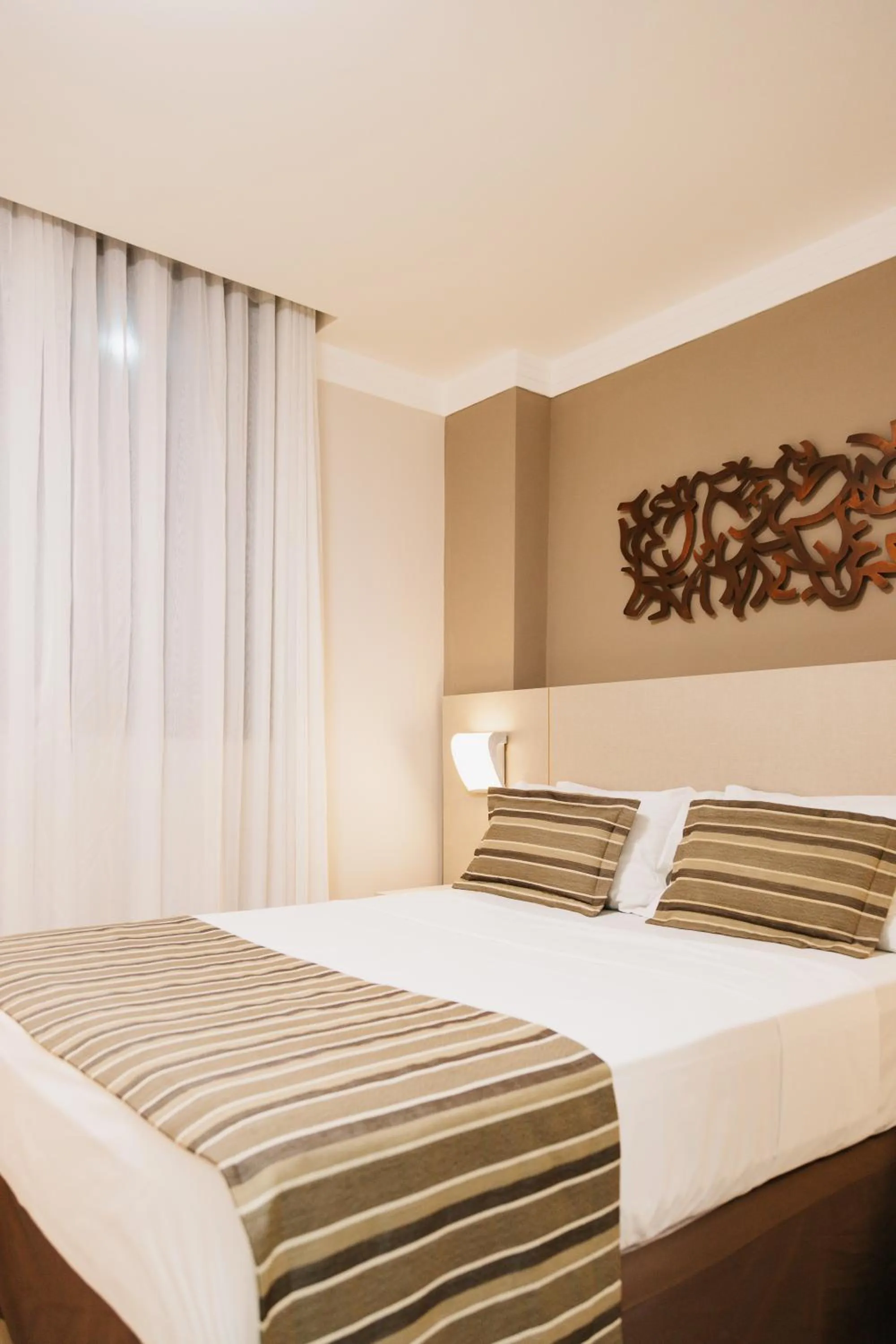 Bed in Lagoon Prime Hotel