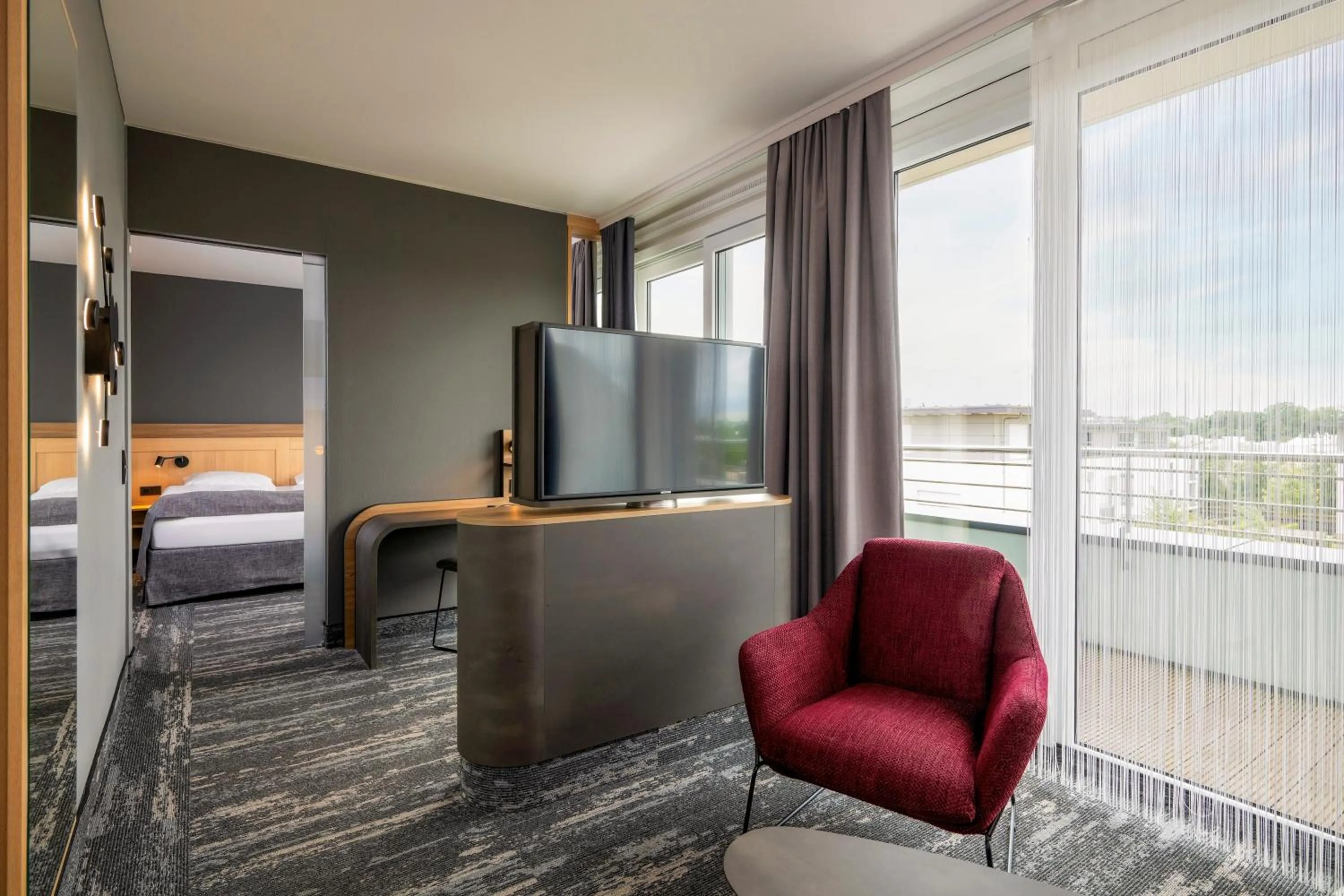 Living room, Bed in Best Western Plus Hotel Papenburg