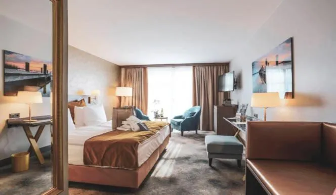 Photo of the whole room, Bed in SCHLOSS Fleesensee