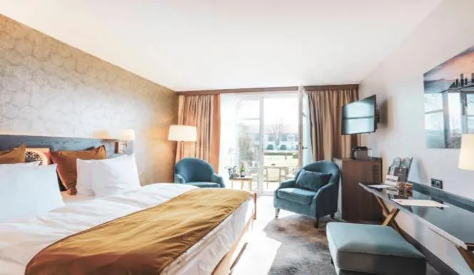 Photo of the whole room, Bed in SCHLOSS Fleesensee