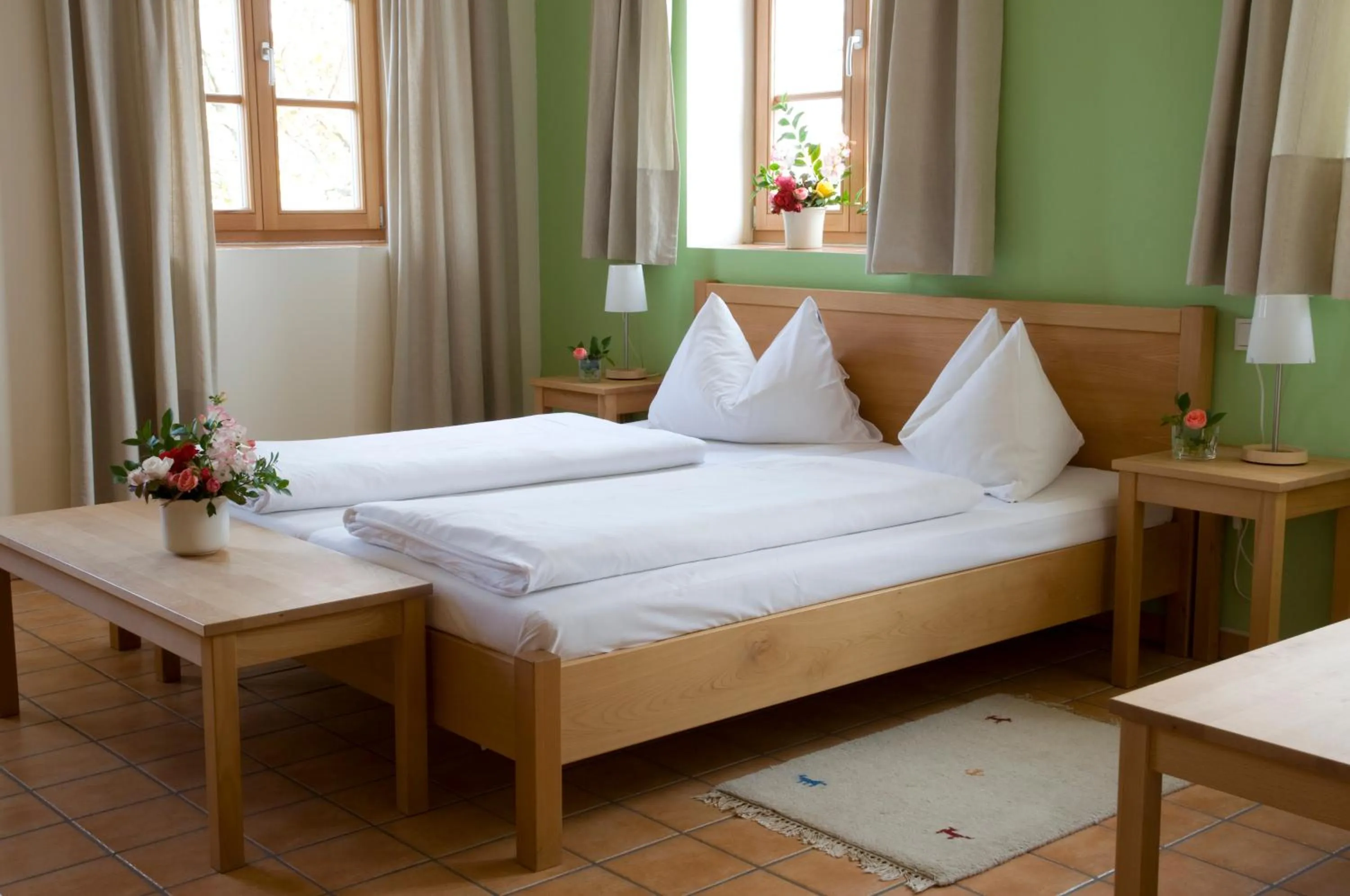 Bed in ad vineas Gästehaus Nikolaihof-Hotel Garni