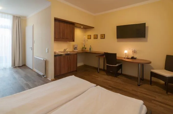 Coffee/tea facilities, Bed in GuestHouse Heidelberg