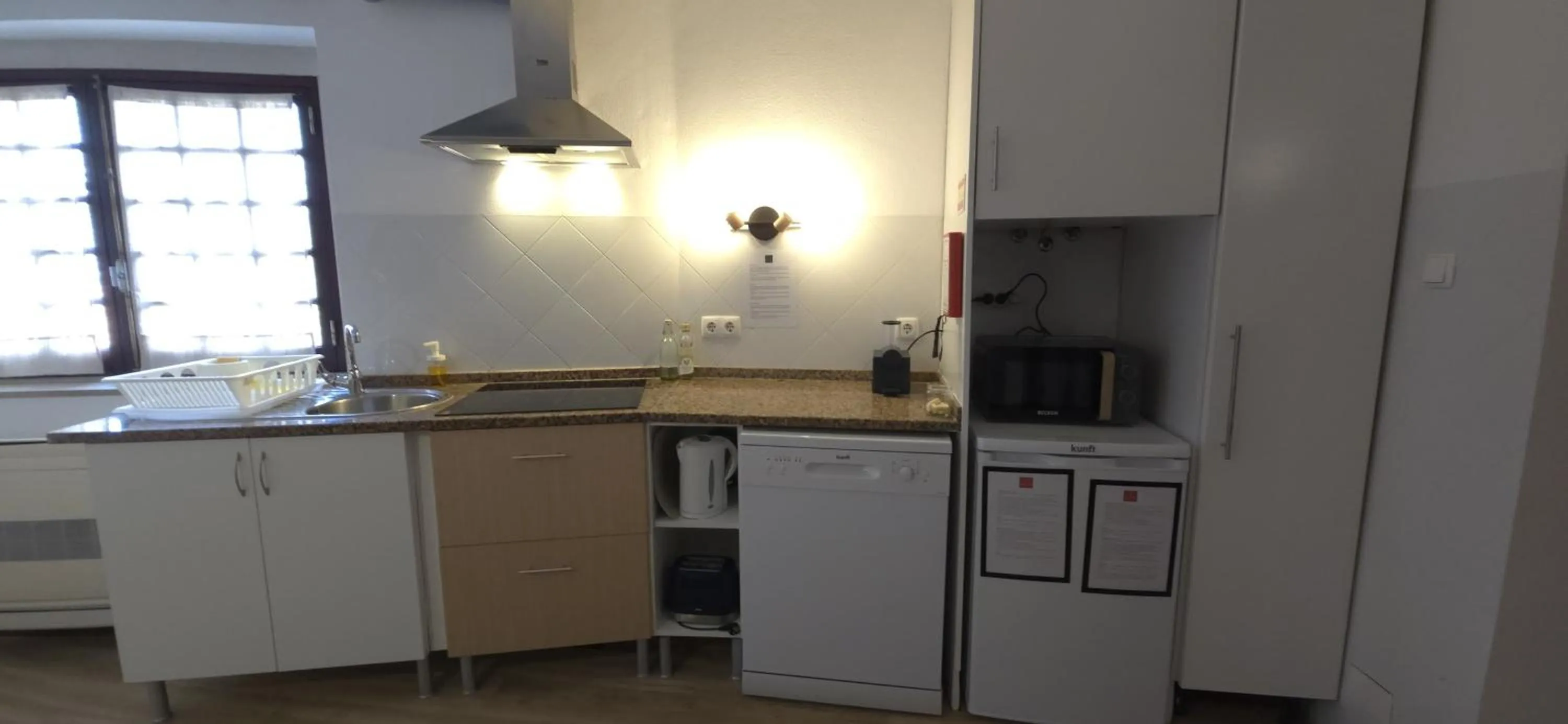 Kitchen or kitchenette in Casas da Biquinha