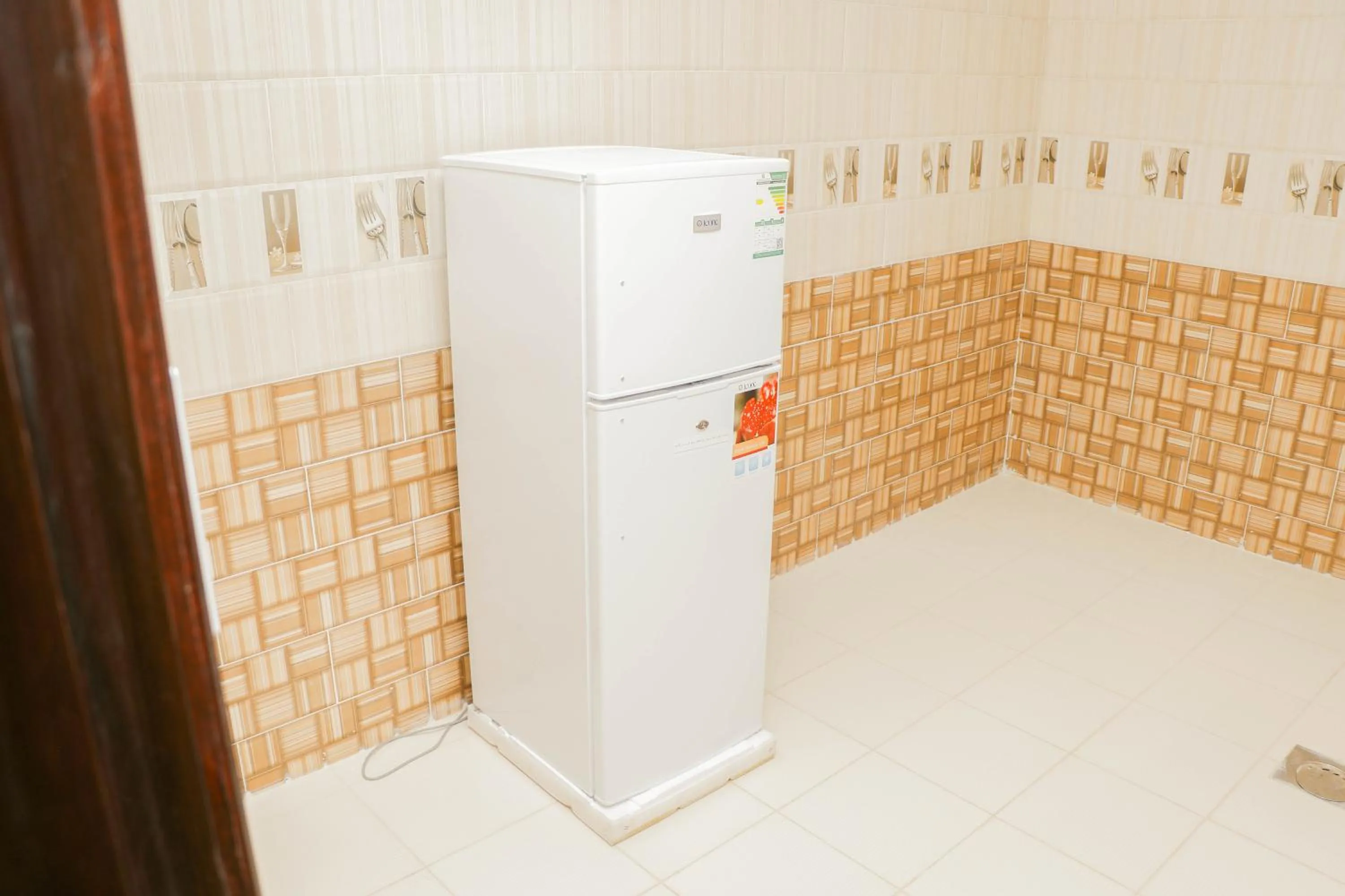 Kitchen or kitchenette in Diafat Alsaadah For Serviced Apartment-Dumat Al Jandal