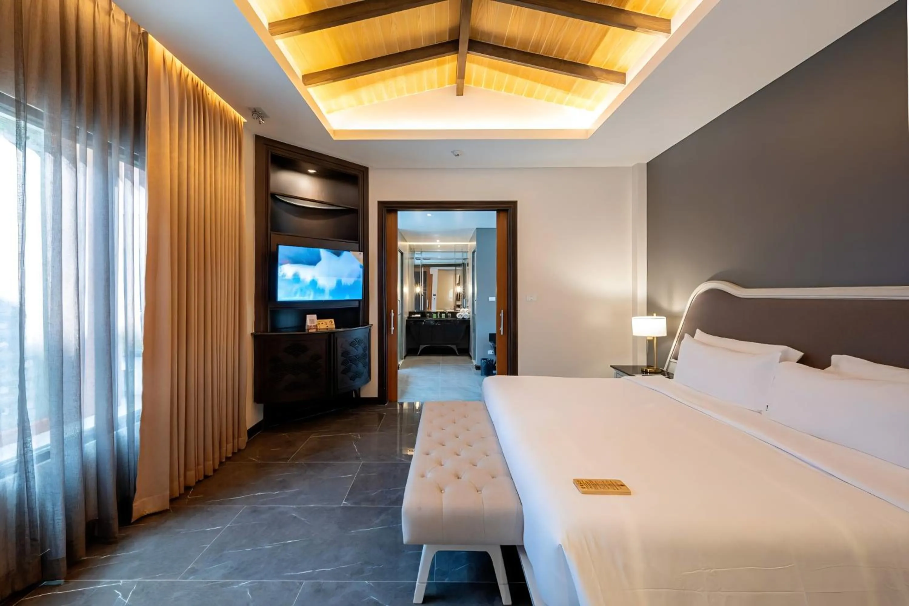 Bed in Phukalini Luxury Pool Villa & Onsen