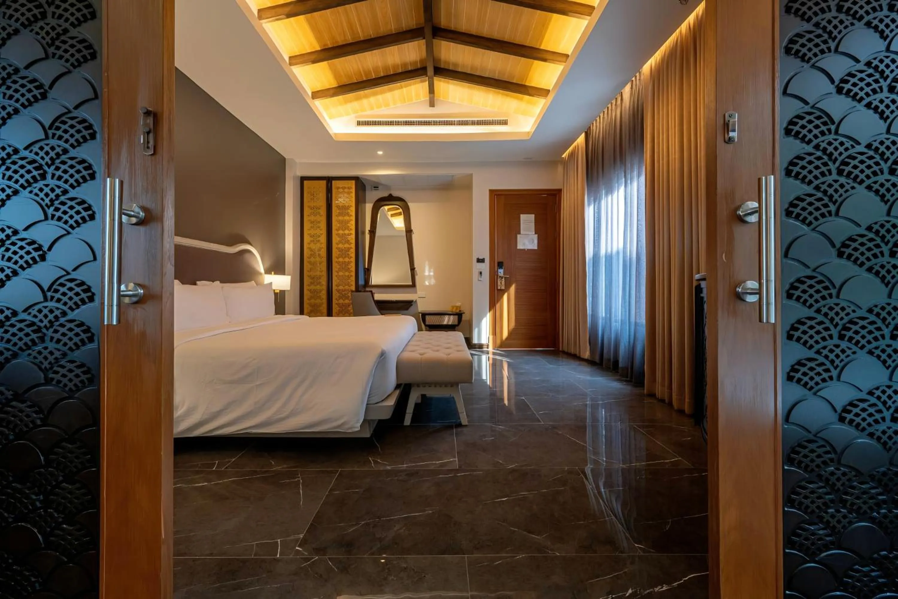 Bed in Phukalini Luxury Pool Villa & Onsen