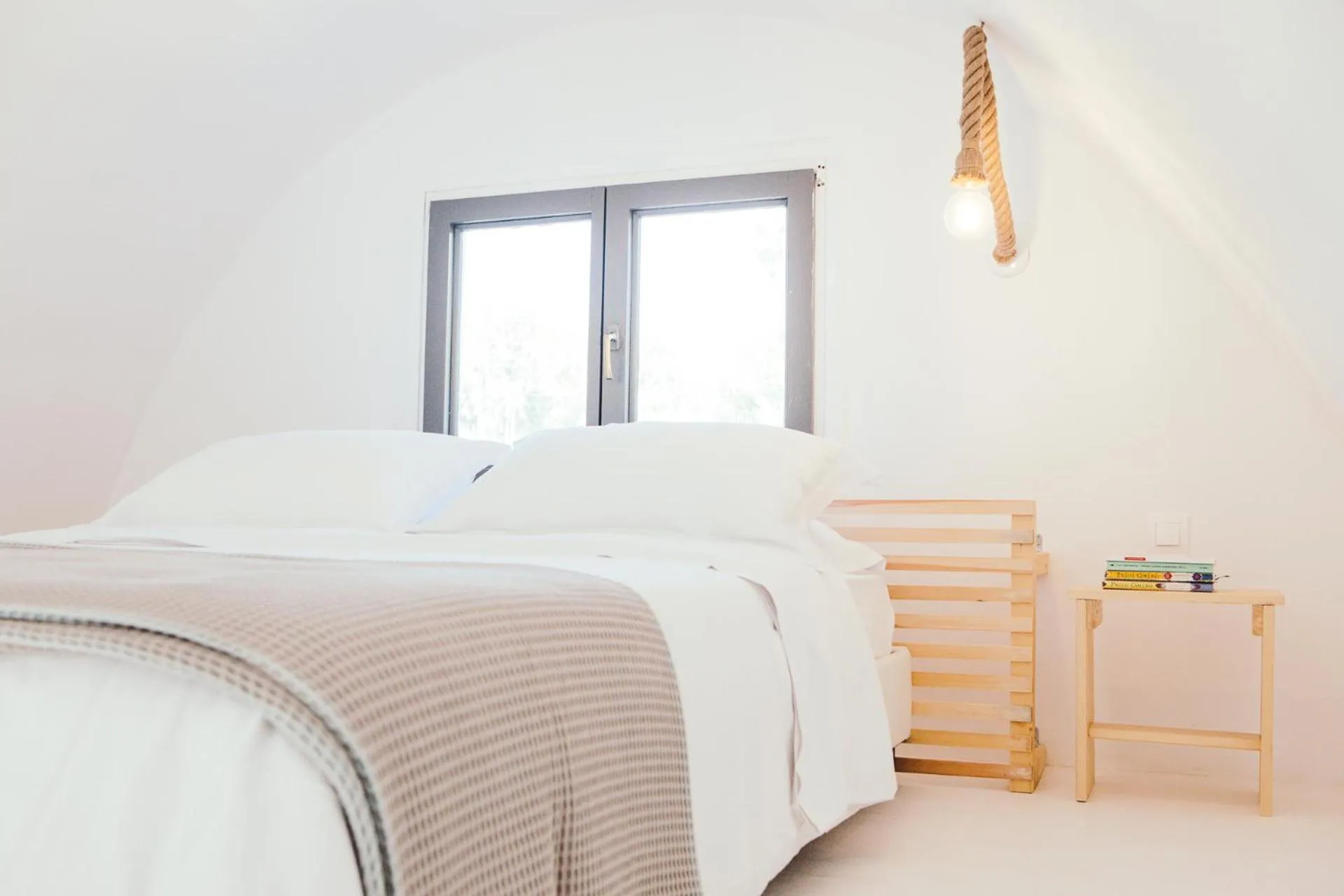 Bed in Exi Sea Side Suites