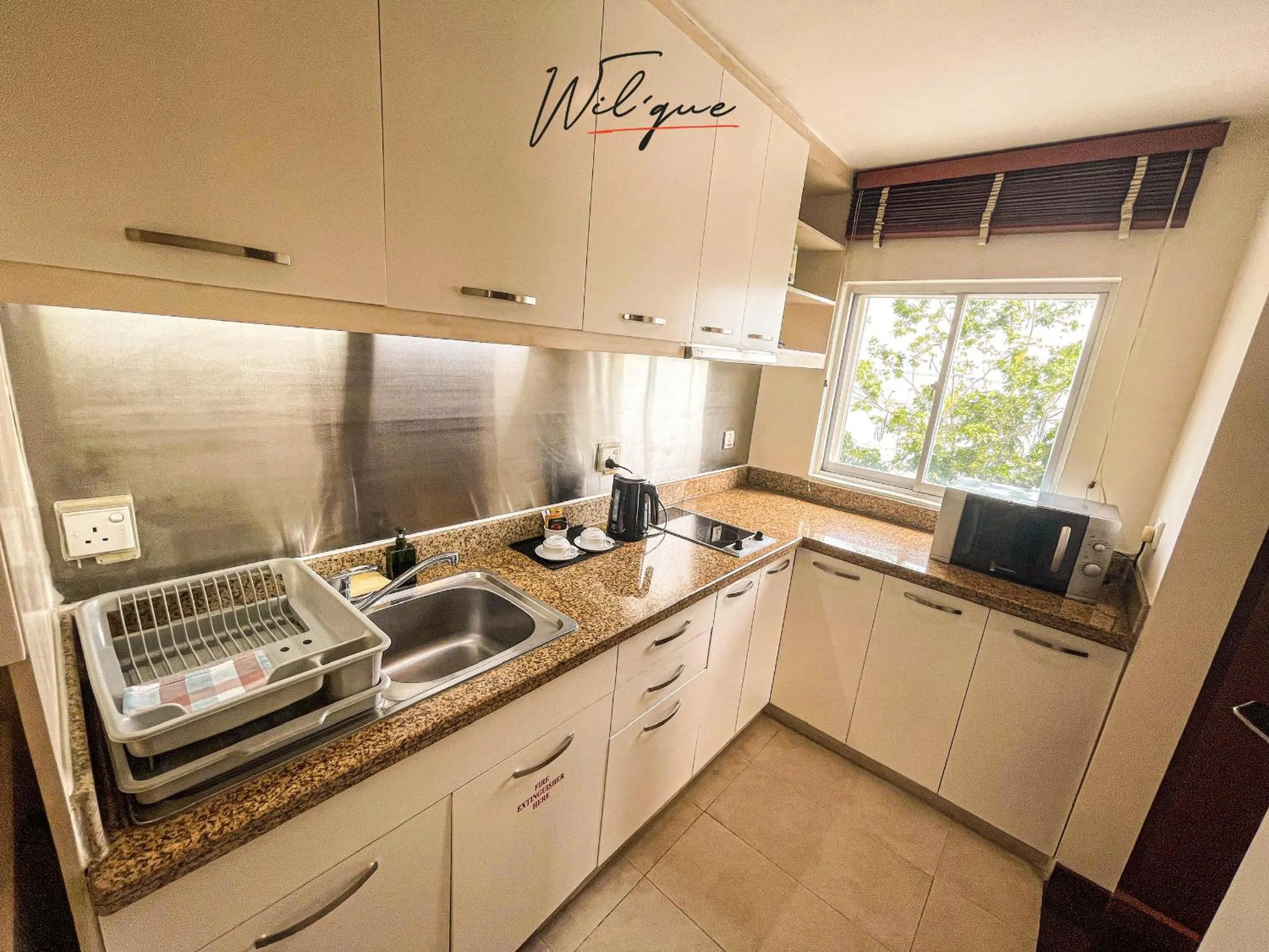 Kitchen or kitchenette in Wil'que Westlake Hotel & Residences
