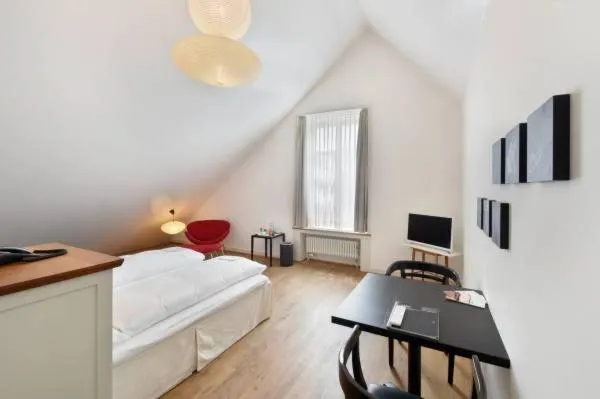 Bed in Hotel im Schlosspark