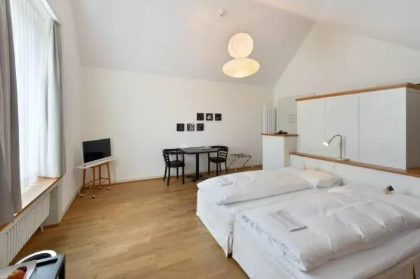 Bed in Hotel im Schlosspark