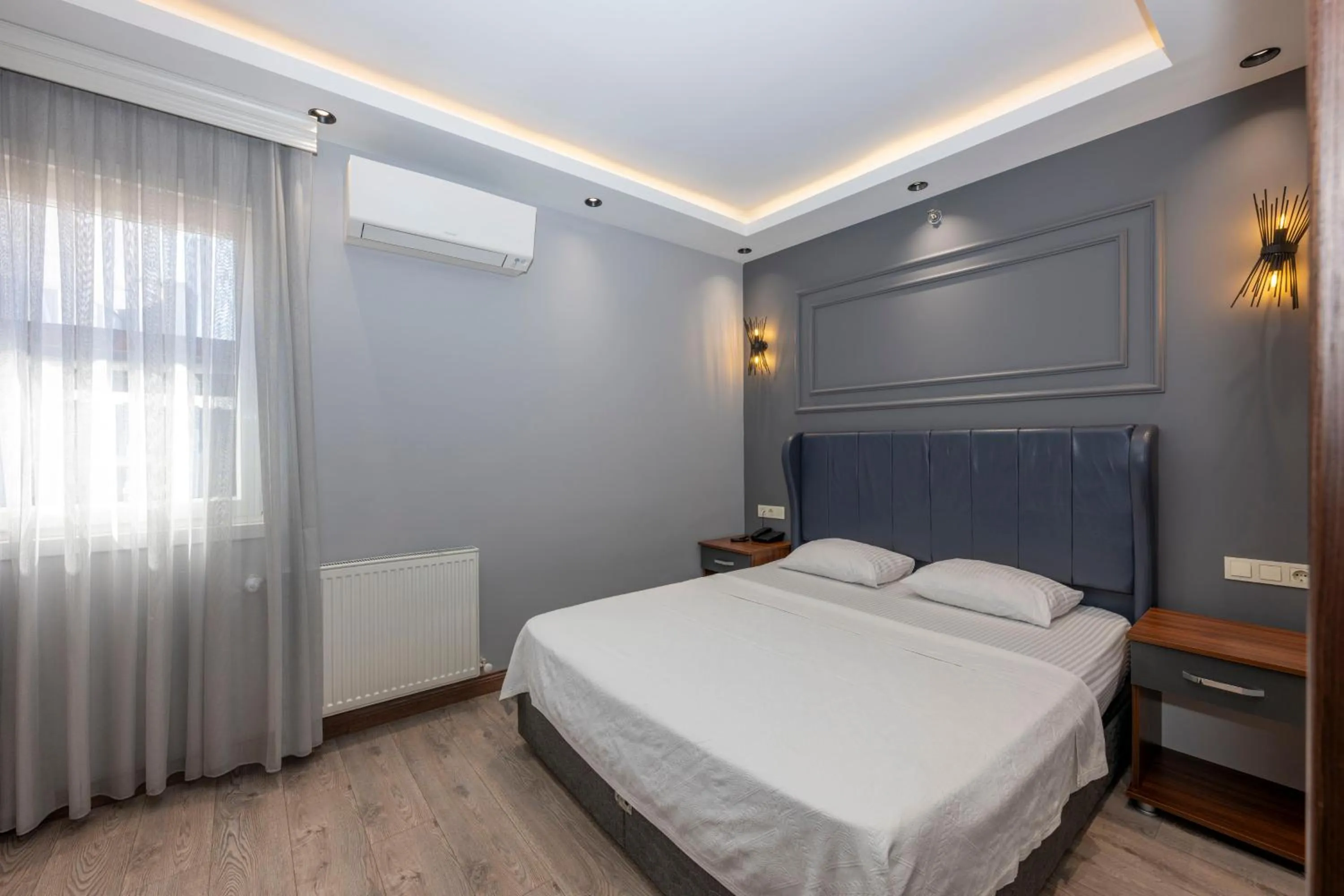 Bed in Comfort Suites Hotel