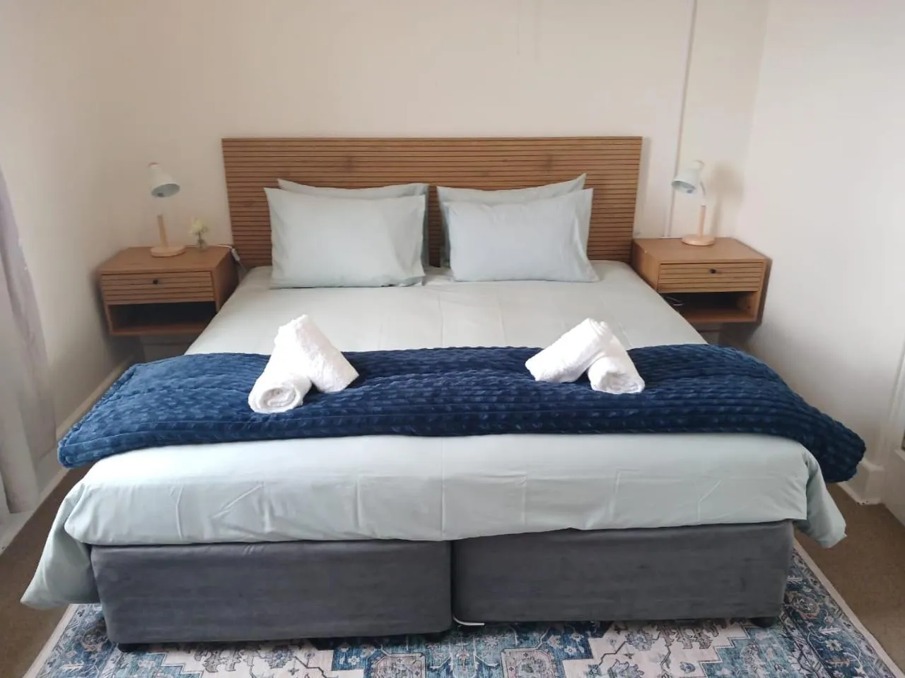 Bed in Boulders Beach Hotel, Cafe and Curio shop