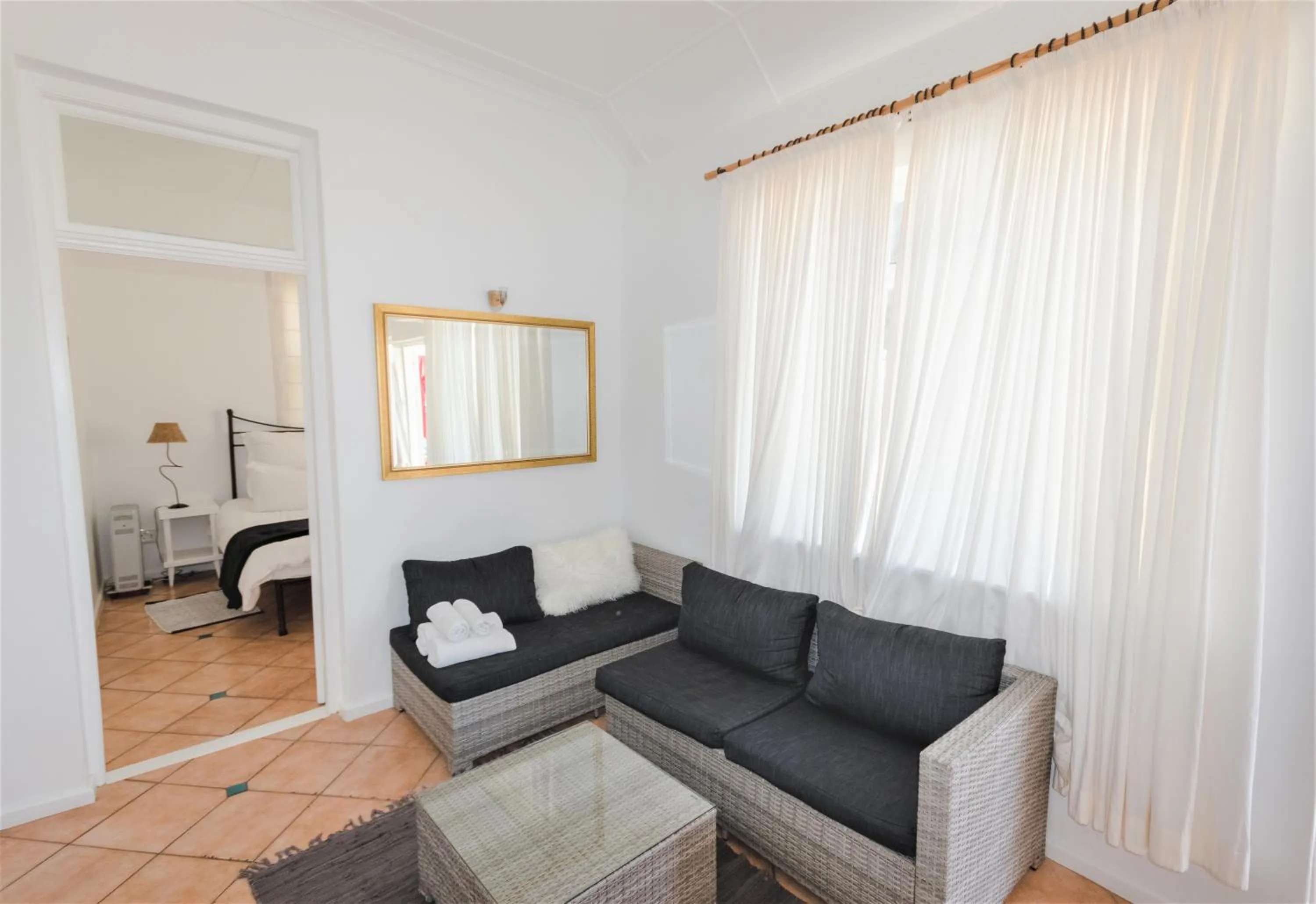 Living room in Boulders Beach Hotel, Cafe and Curio shop