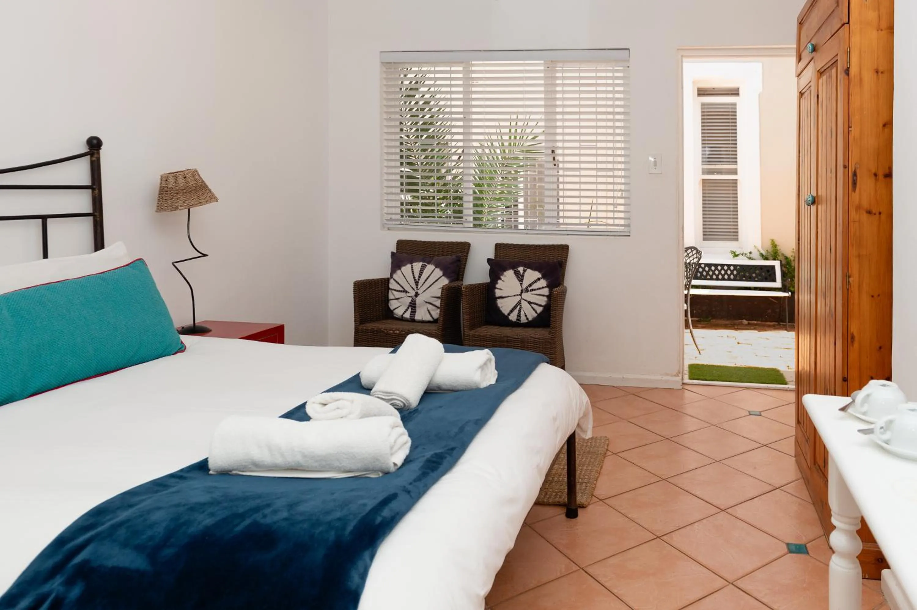 Bed in Boulders Beach Hotel, Cafe and Curio shop