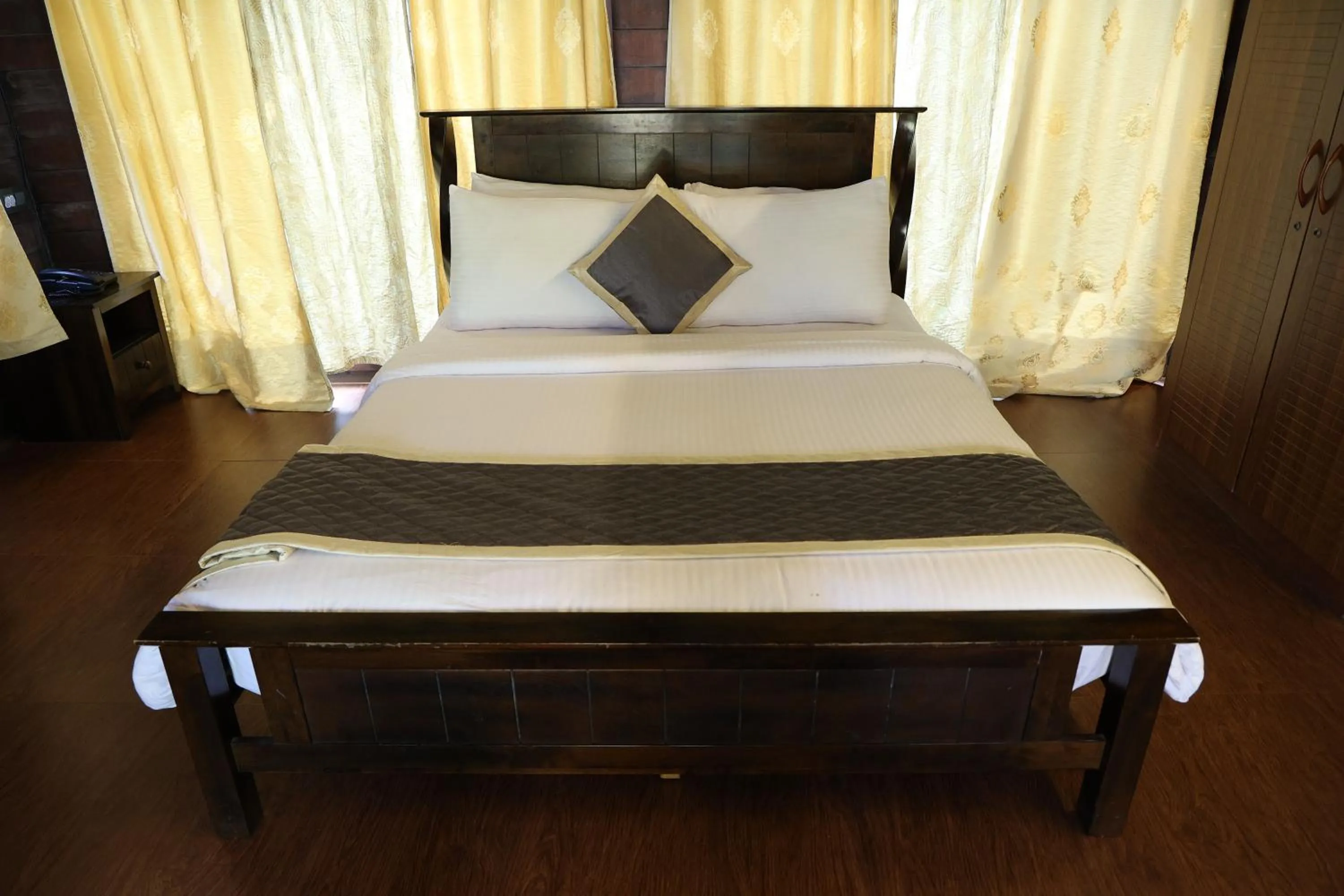 Bed in Three Hills Resort Coorg