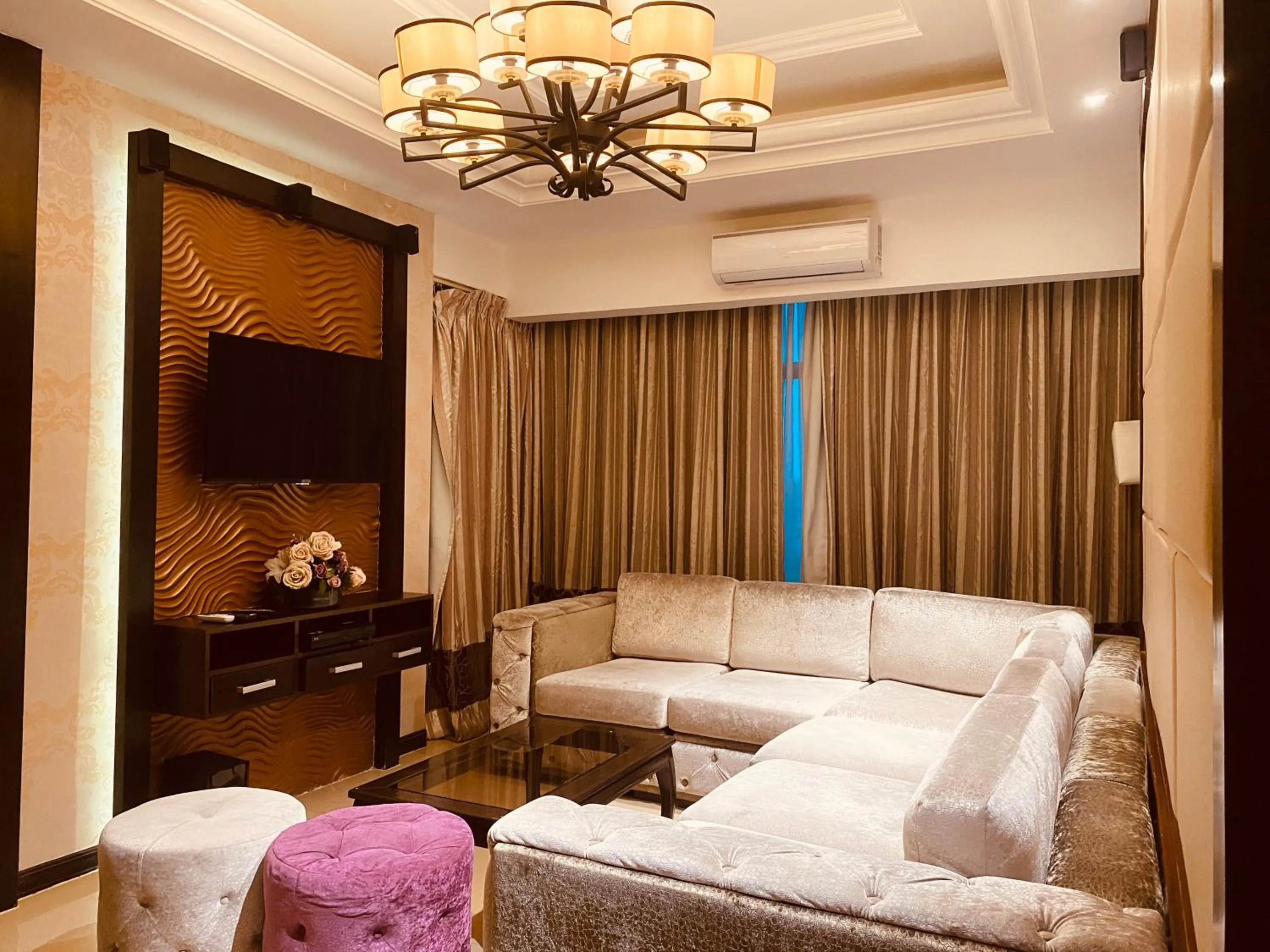 Living room, Bed in Prime Asia Hotel