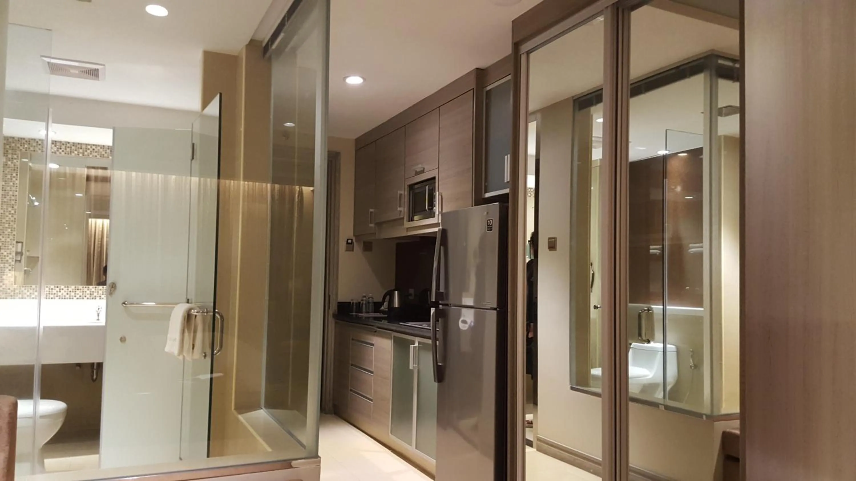 Kitchen or kitchenette in Prime Asia Hotel