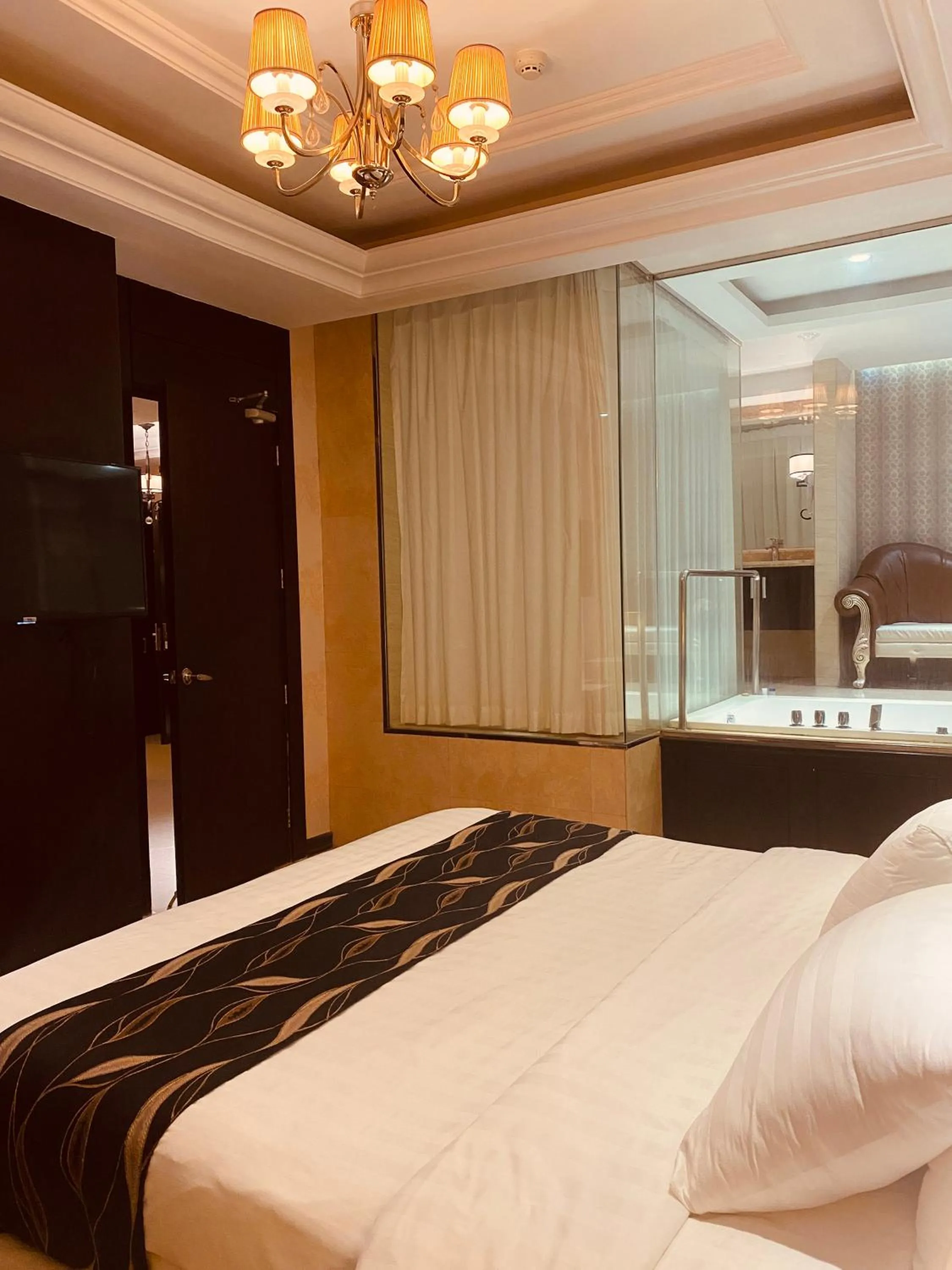 Bed in Prime Asia Hotel