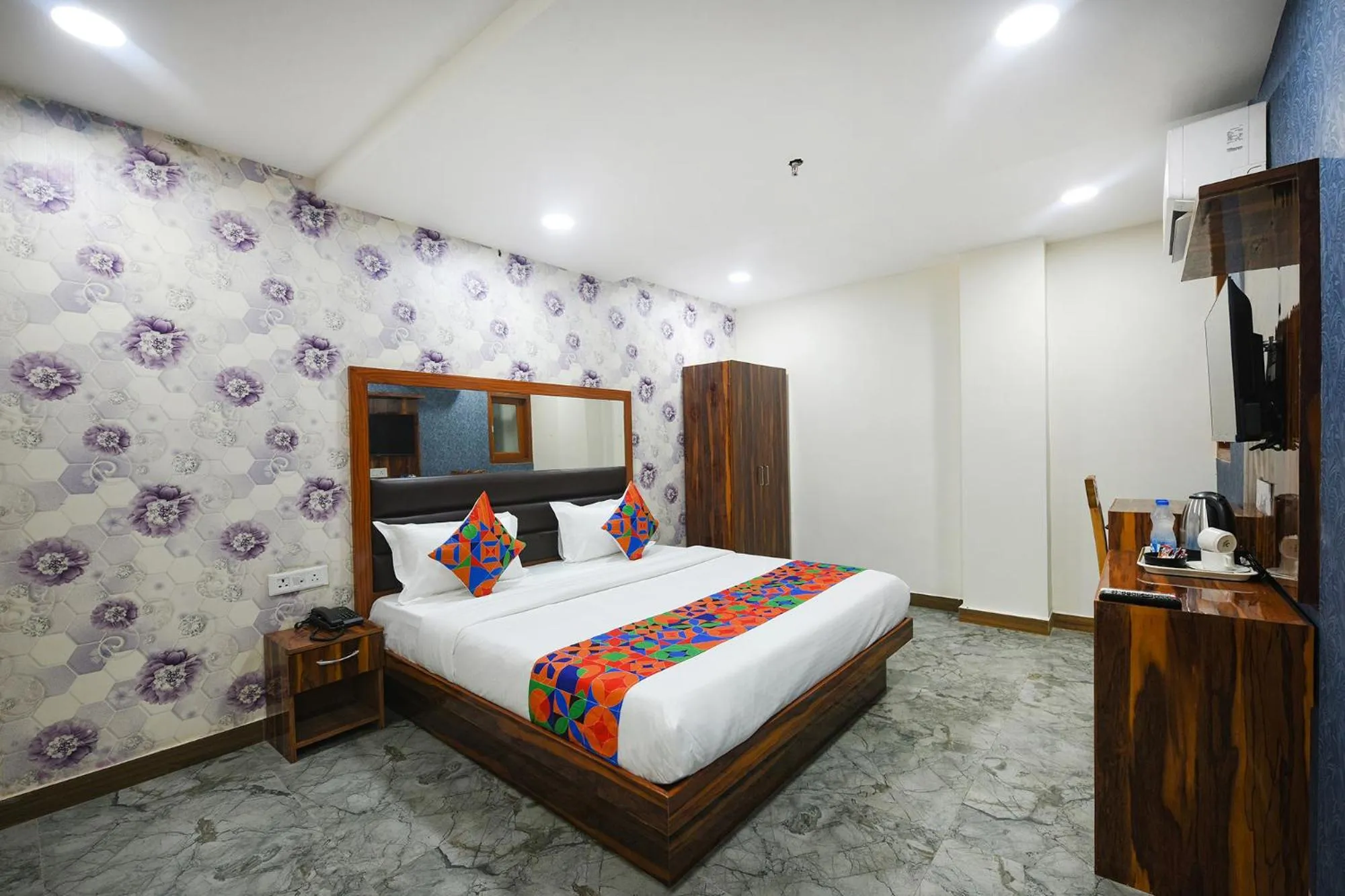 Bed in FabHotel Mona Continental - Nr Laxmi Nagar IT Hub