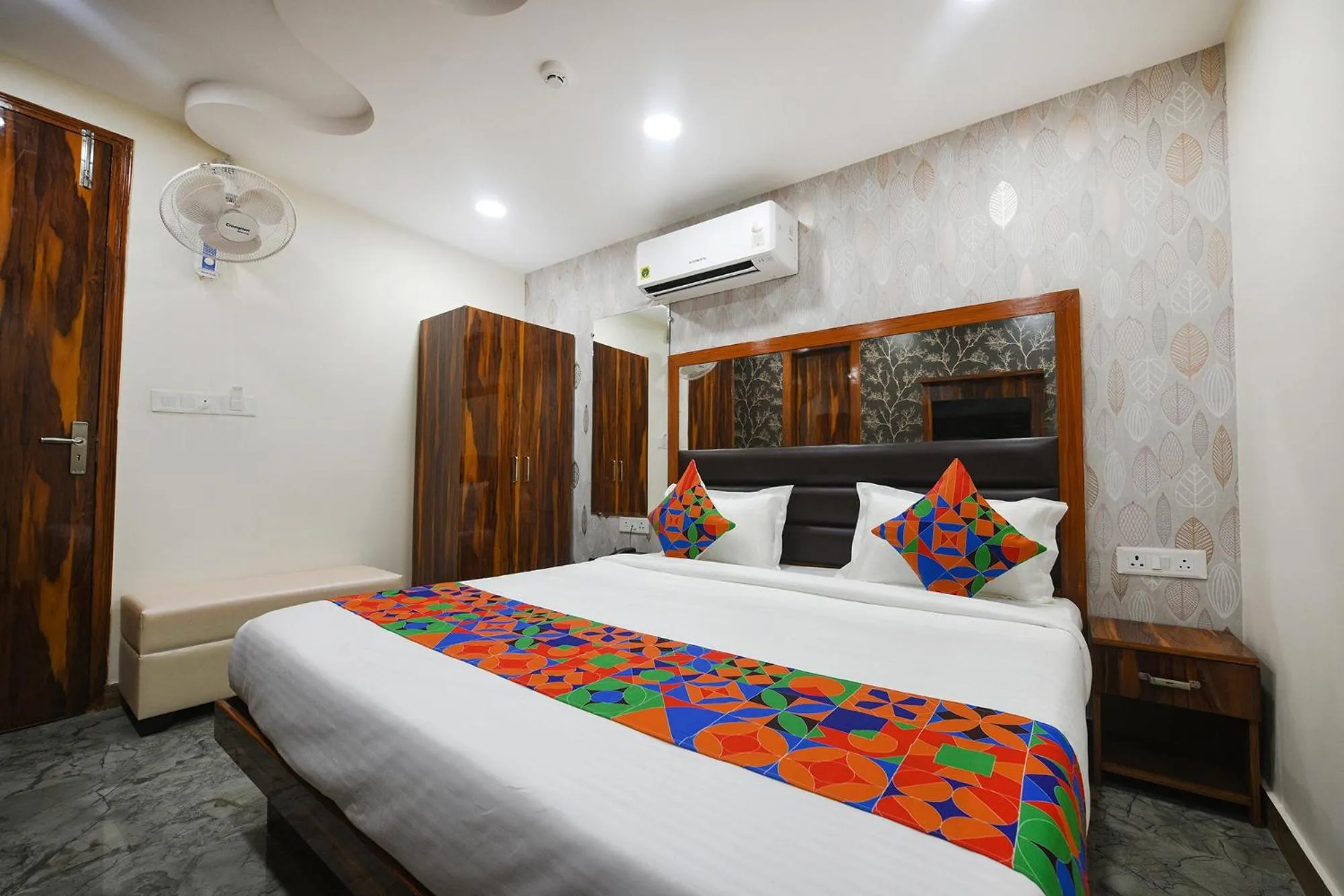 Bed in FabHotel Mona Continental - Nr Laxmi Nagar IT Hub