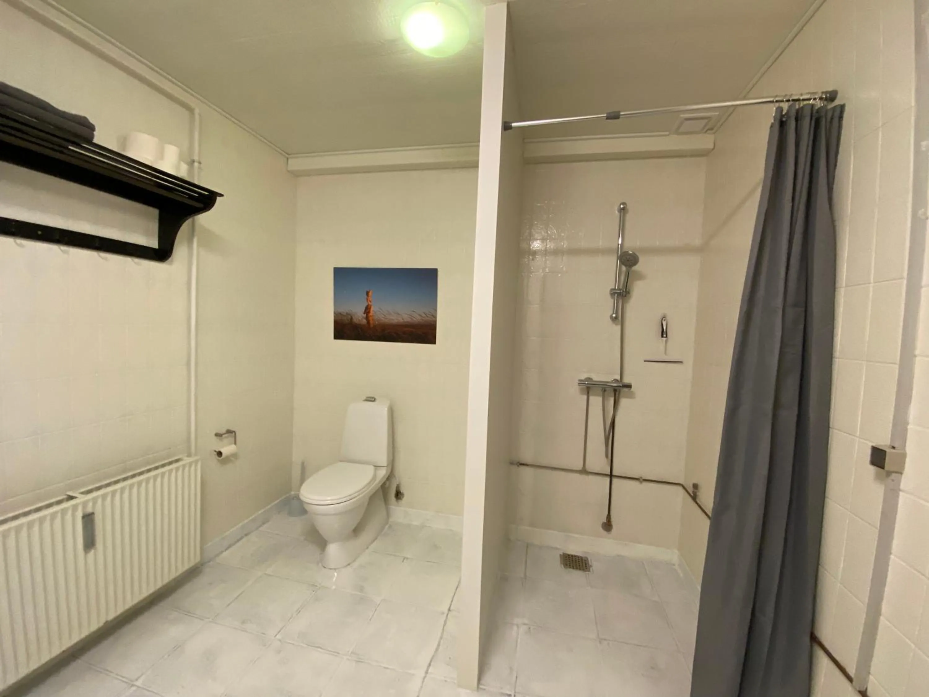 Bathroom in Studio Apartment in the heart of Højer